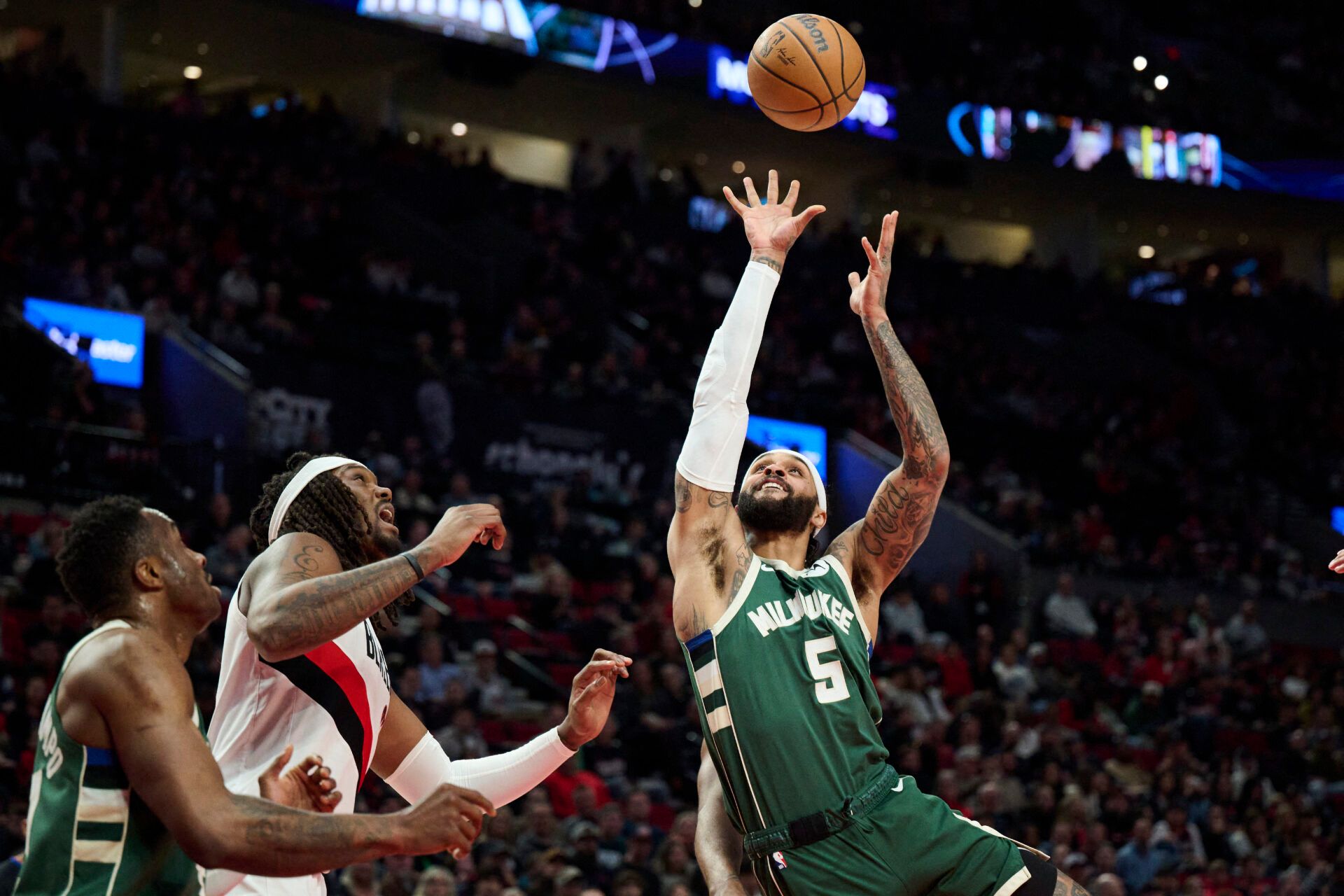 Milwaukee Bucks guard Gary Trent Jr. (5) puts up a shot during the first half against Portland Trail Blazers center Robert Williams III (35) at Moda Center.