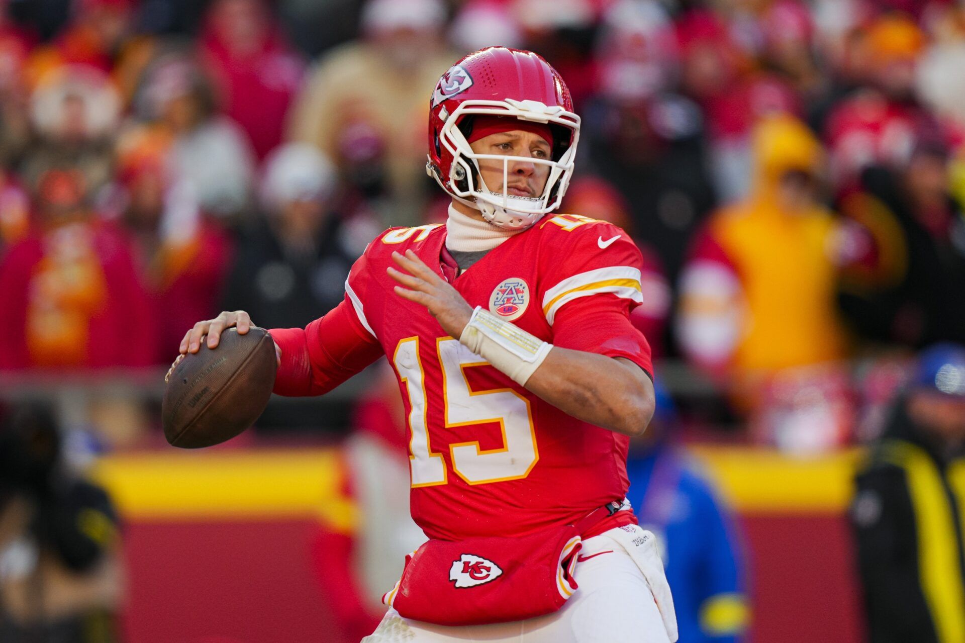 Kansas City Chiefs quarterback Patrick Mahomes (15) throws a pass during the second half against the Los Angeles Chargers at GEHA Field at Arrowhead Stadium.