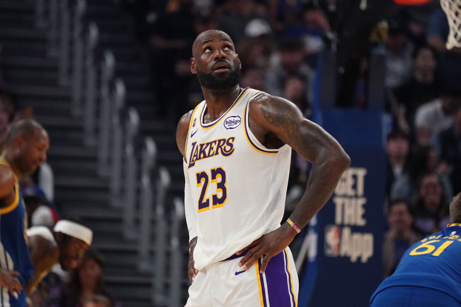 Los Angeles Lakers forward LeBron James (23) waits for play to resume against the Golden State Warriors in the second quarter at Chase Center.