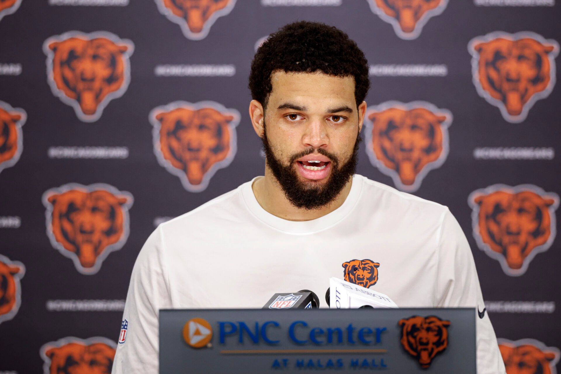 Chicago Bears quarterback Caleb Williams (18) speaks during Minicamp at Halas Hall.