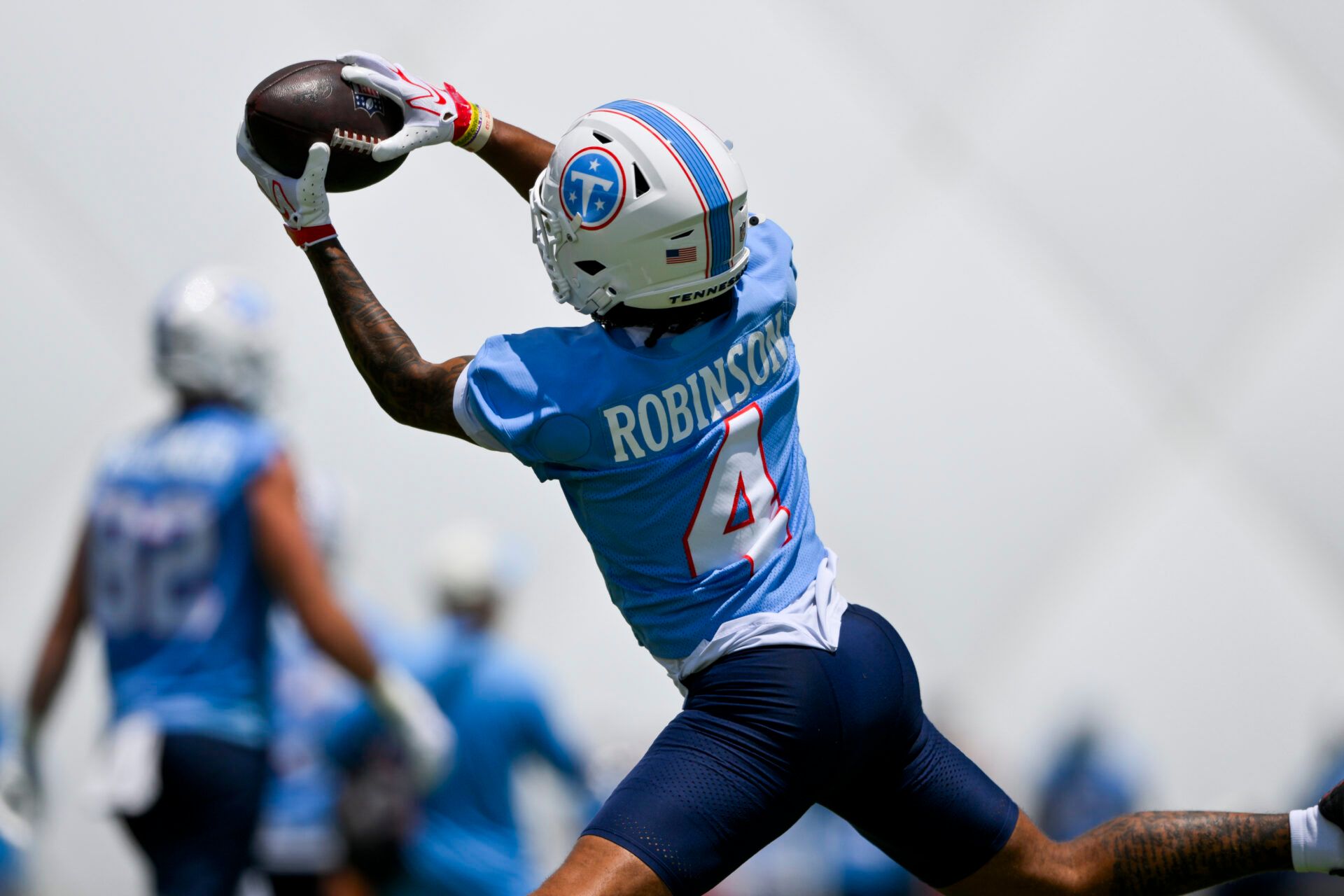 Tennessee Titans wide receiver Wan'Dale Robinson (4) makes a catch during day 1 of mini-camp at Vanderbilt Health Football Center.