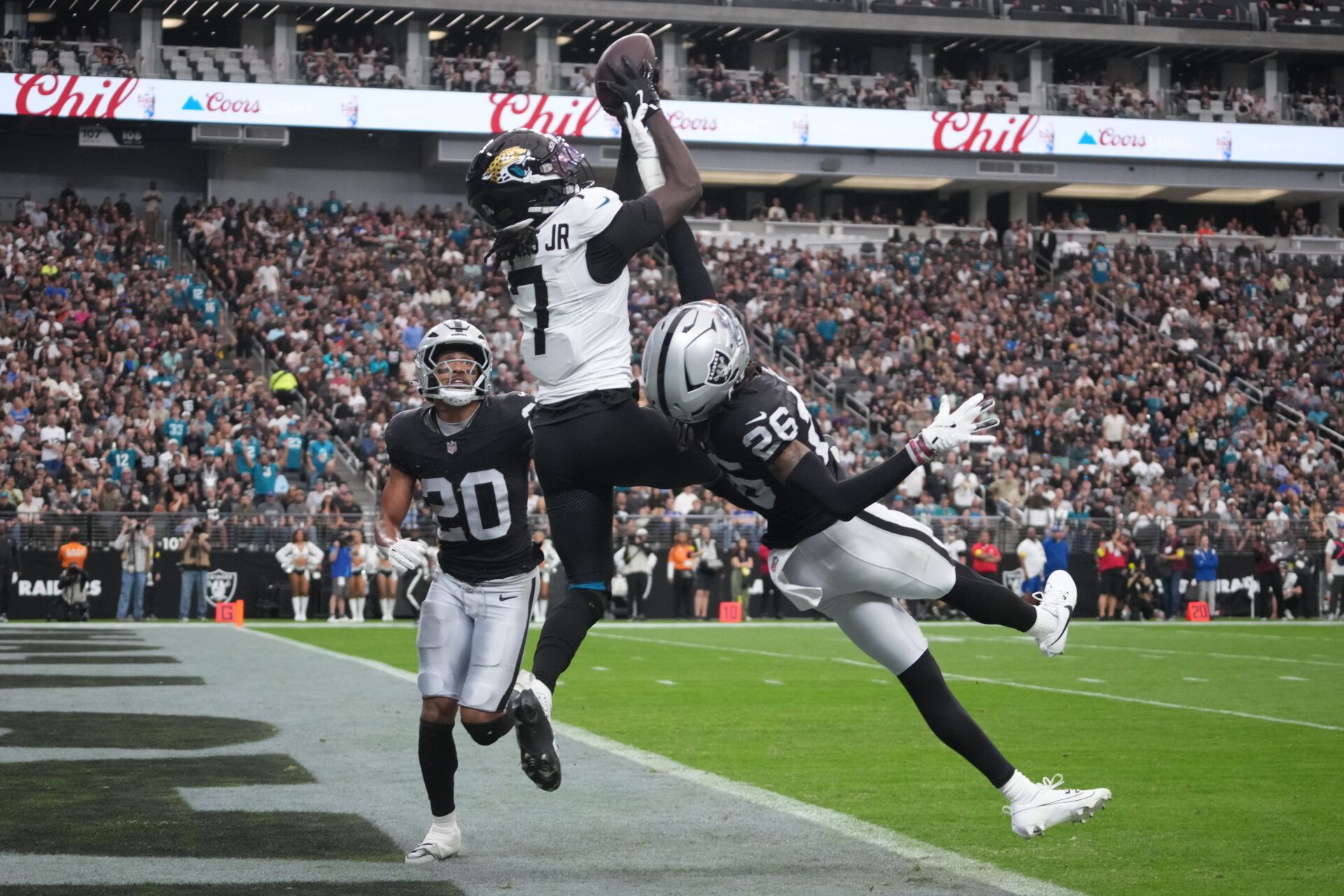 Jacksonville Jaguars wide receiver Brian Thomas Jr. (7) attempts a catch during the first half against the Las Vegas Raiders at Allegiant Stadium.