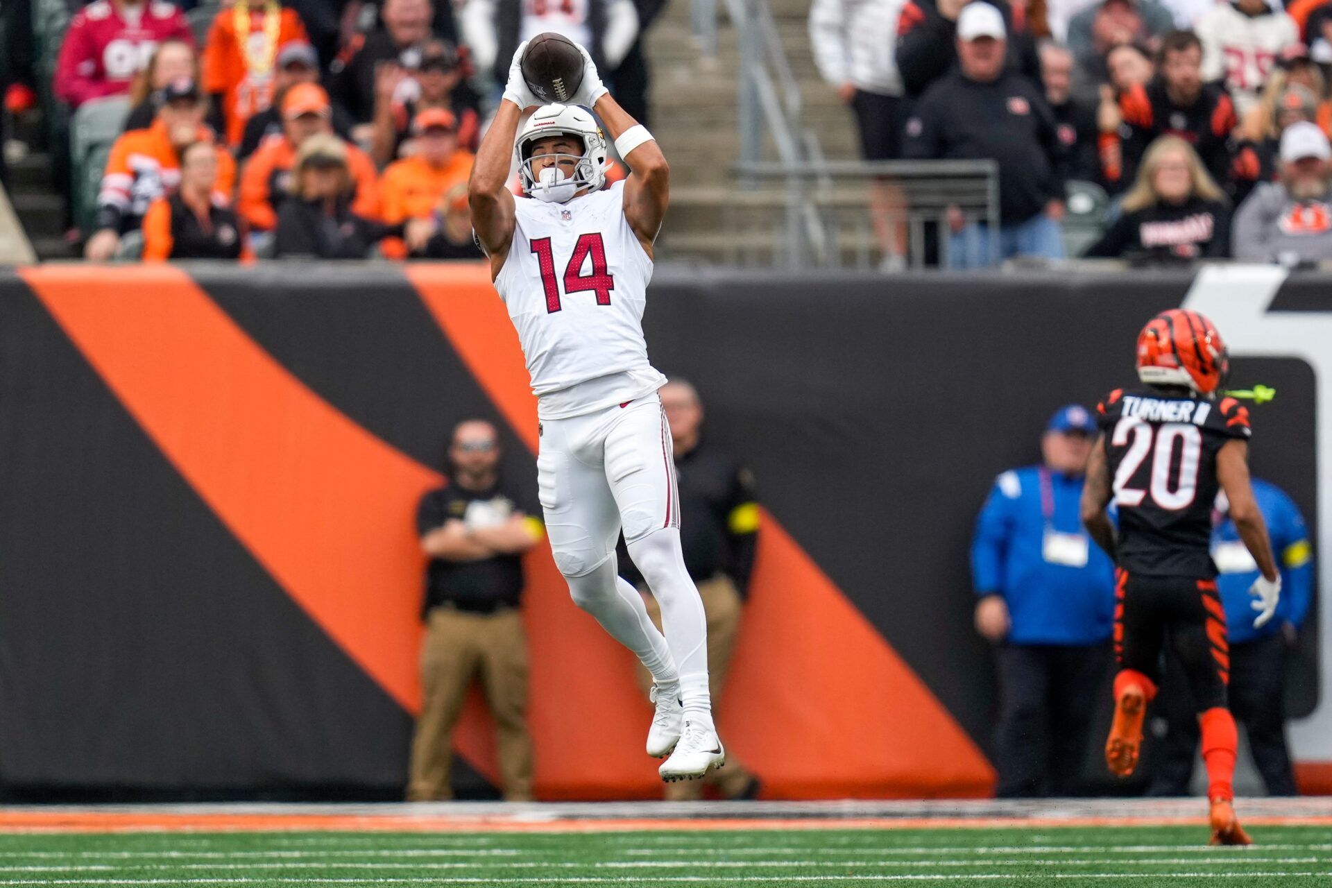 Arizona Cardinals wide receiver Michael Wilson (14) catches a pass before running for a touchdown in the second quarter of the NFL Week 17 game between the Cincinnati Bengals and the Arizona Cardinals at Paycor Stadium in Downtown Cincinnati on Sunday, Dec. 28, 2025. The Bengals led 23-7 at halftime.