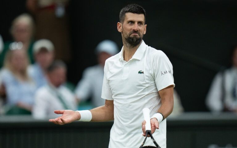 Novak Djokovic of Serbia reacts during his match against Felix Auger-Aliassime of Canada on day nine at All England Lawn Tennis and Croquet Club.
