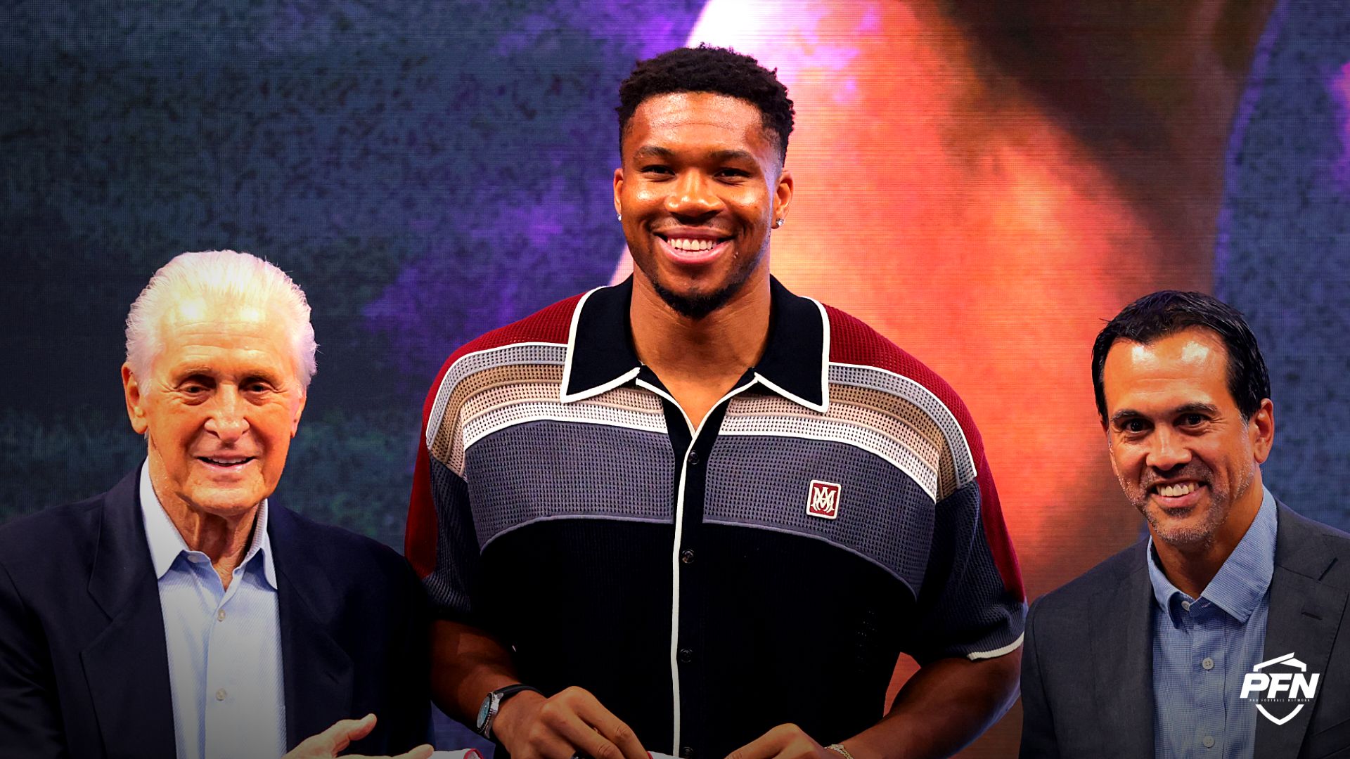 Miami Heat forward Giannis Antetokounmpo (7) is introduced as a new member of the team by Miami Heat president Pat Riley (left) and head coach Erik Spoelstra (right) during a press conference at Kaseya Center.