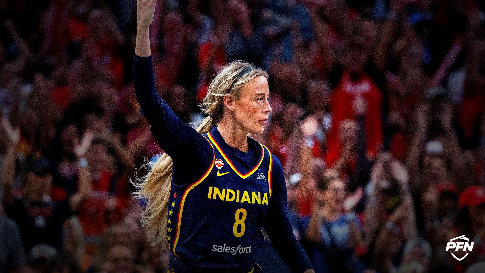 Indiana Fever guard Sophie Cunningham (8) celebrates a made basket in the second half against the New York Liberty at Gainbridge Fieldhouse.