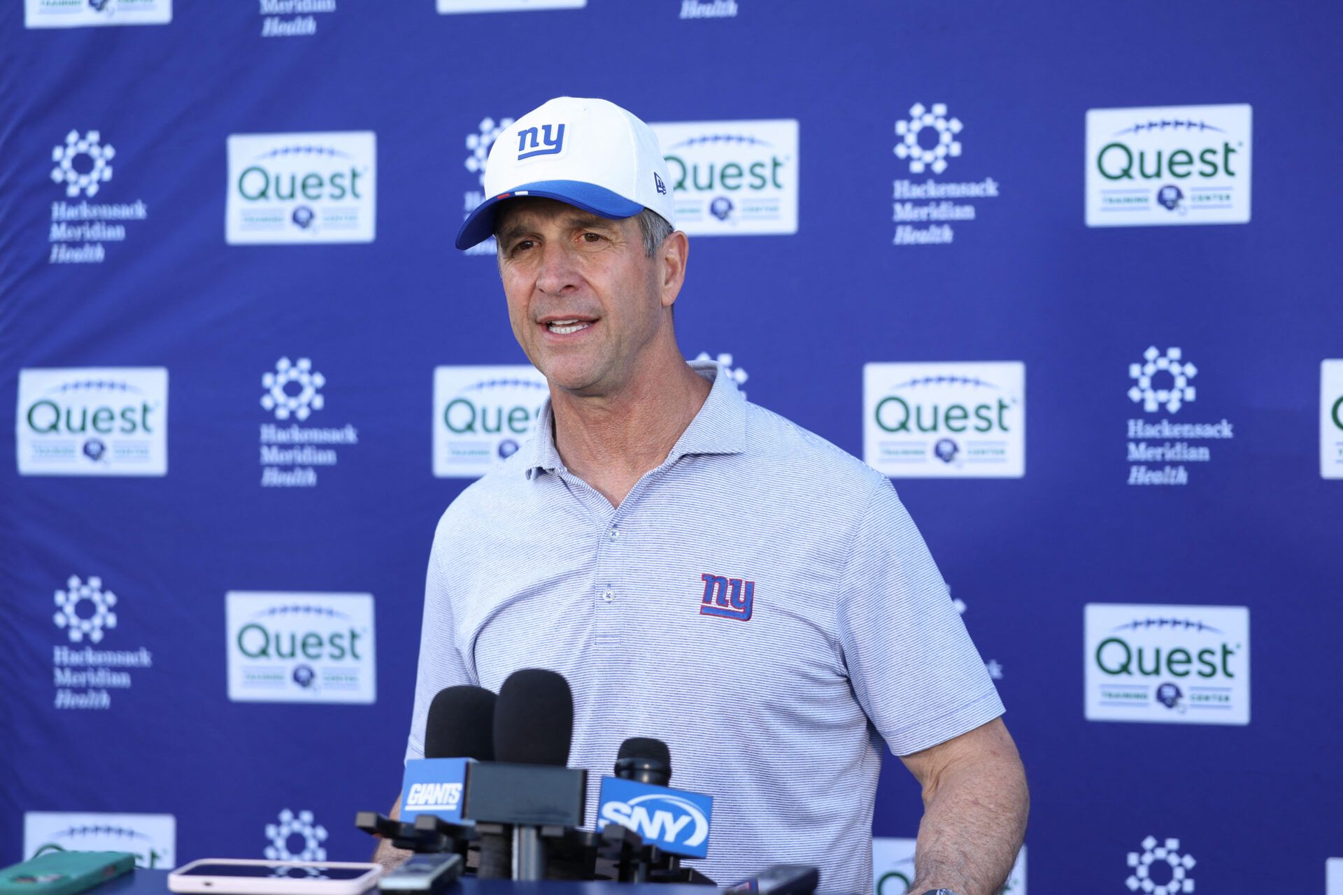 New York Giants head coach John Harbaugh answers questions from the press after the minicamp activities at Quest Diagnostics Center.