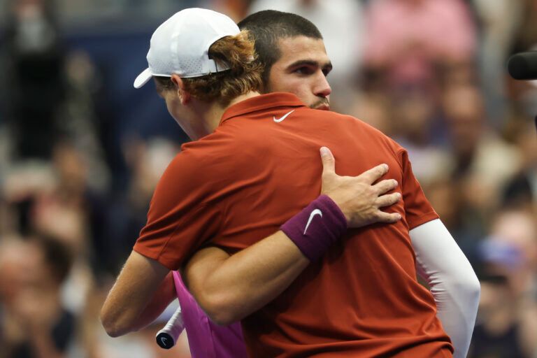 Carlos Alcaraz (ESP) hugs Jannik Sinner (ITA) after the final of mens singles at Billie Jean King National Tennis Center.