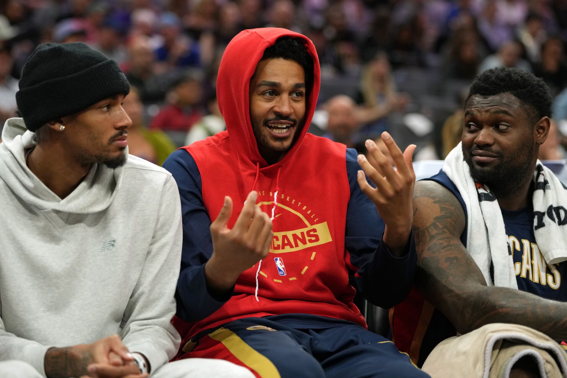 New Orleans Pelicans guard Jordan Poole (center) talks with guard Dejounte Murray (left) and forward Zion Williamson (right) during the third quarter against the Sacramento Kings at Golden 1 Center.