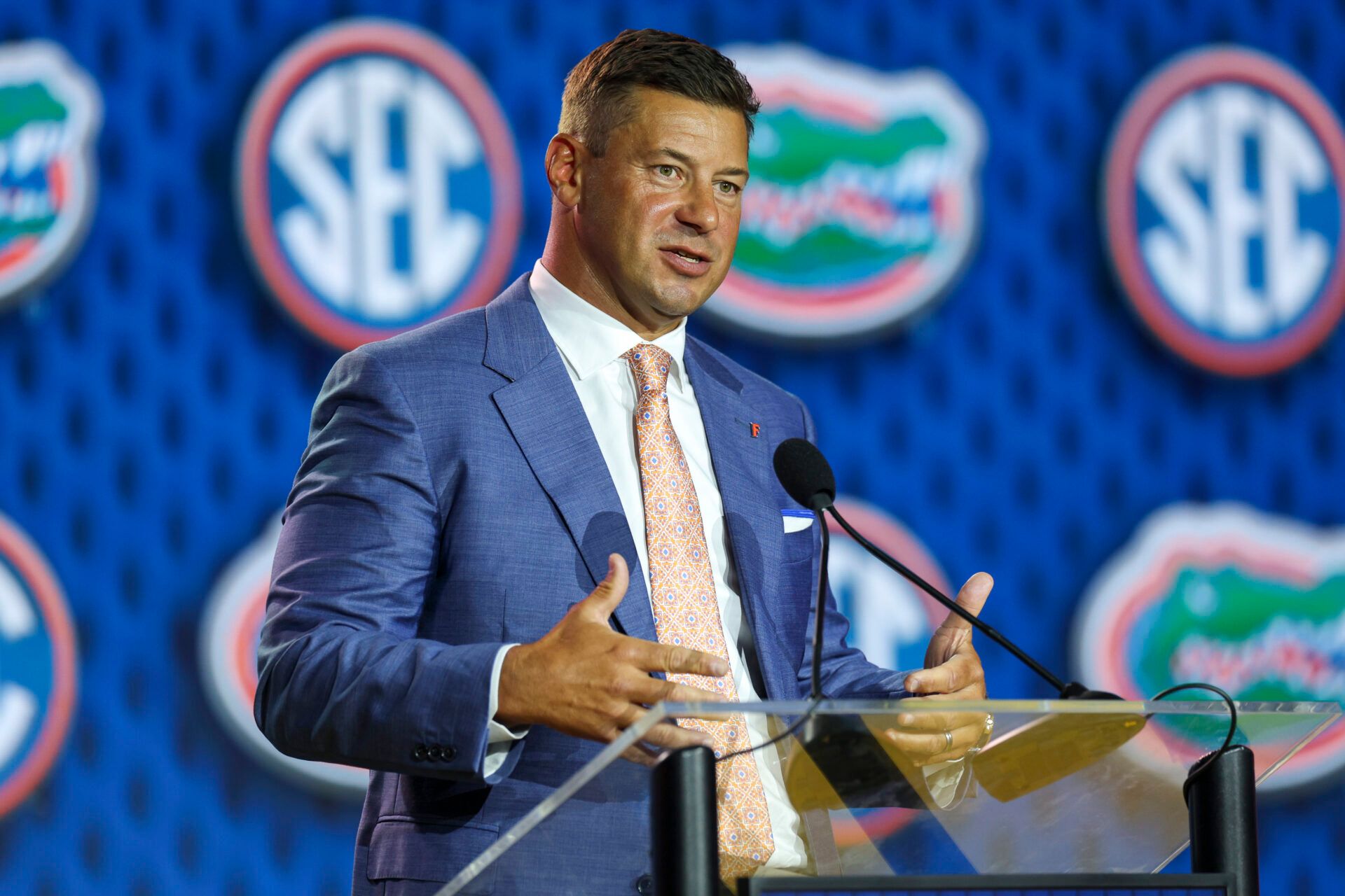 Florida Gators head coach Jon Sumrall speaks to the press during SEC Football Kickoff Media Day at the Tampa Marriott.