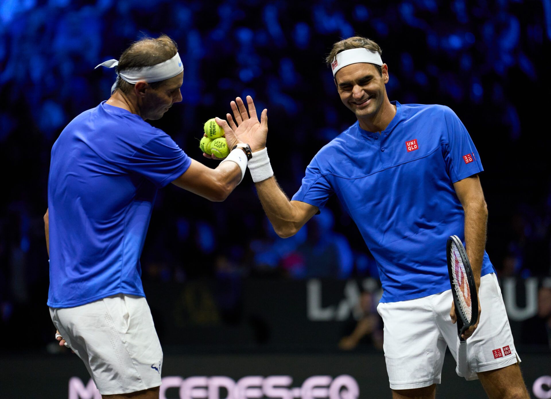 Roger Federer (SUI) playing doubles with Rafael Nadal (ESP) against partners Jack Sock (USA) and Frances Tiafoe in his Laver Cup Tennis match.
