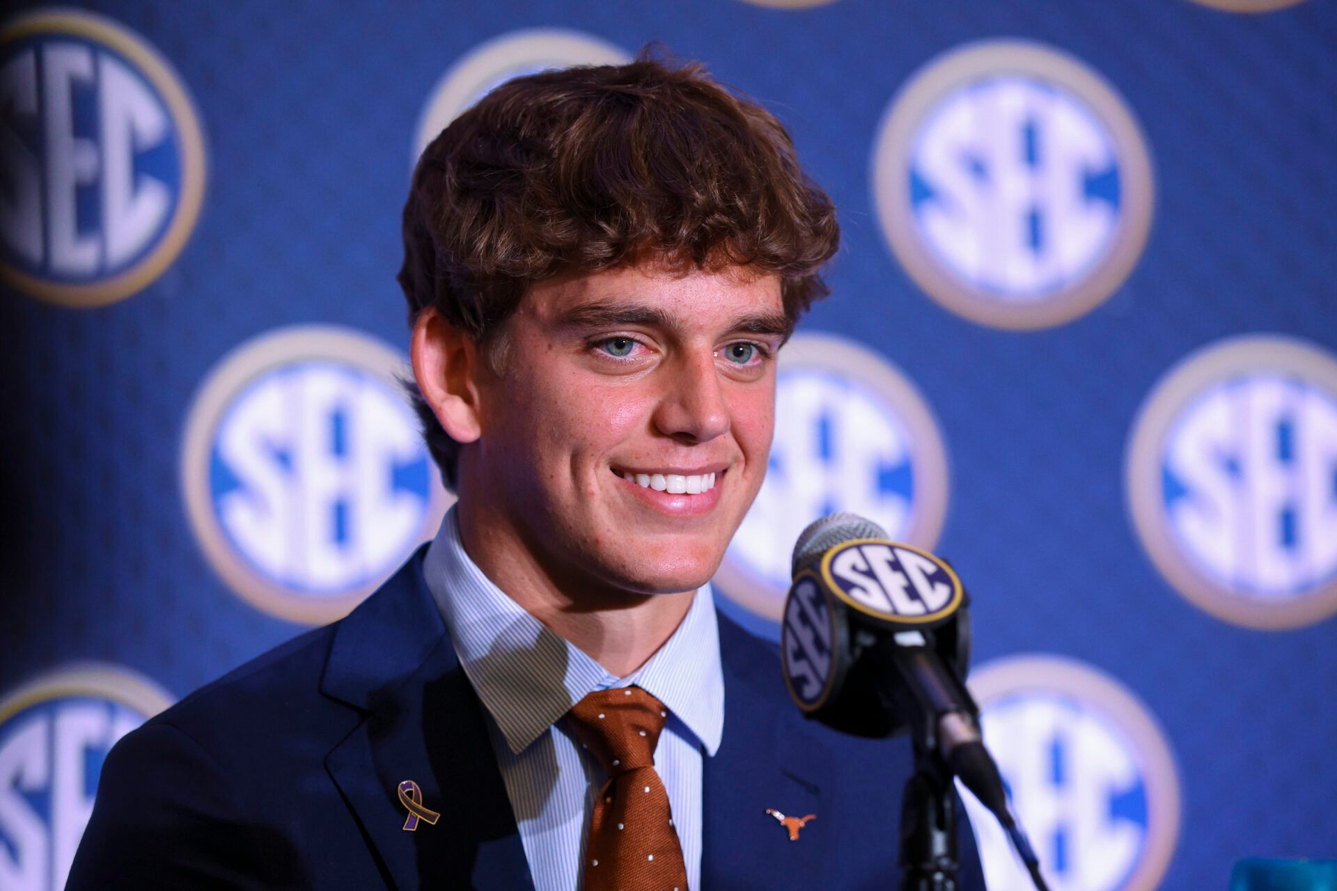Texas Longhorns quarterback Arch Manning (16) speaks to the press during SEC Football Kickoff Media Day at the Tampa Marriott.