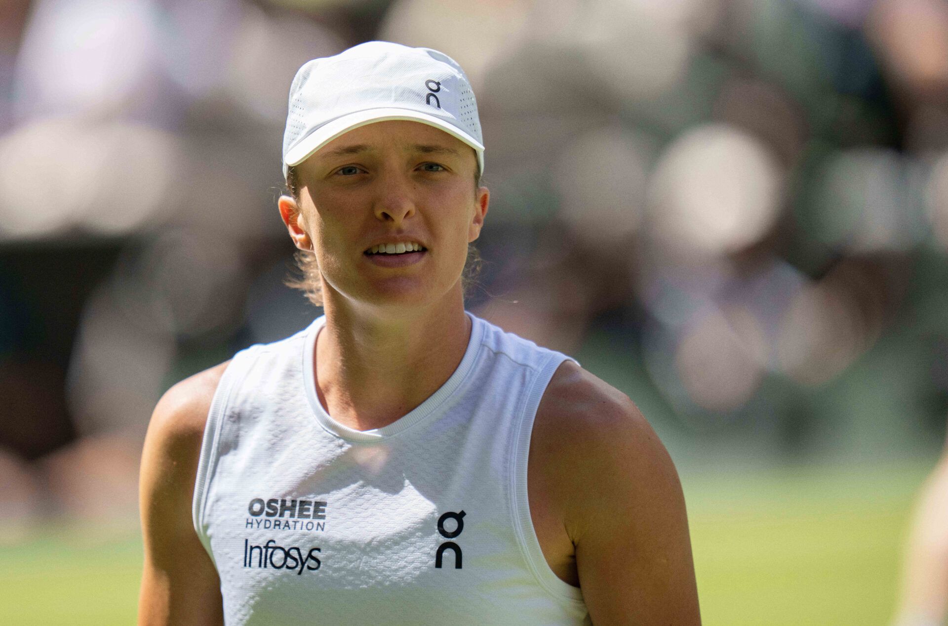 Iga Swiatek of Poland during her match against Taylor Townsend of the United States on day two at All England Lawn Tennis and Croquet Club.