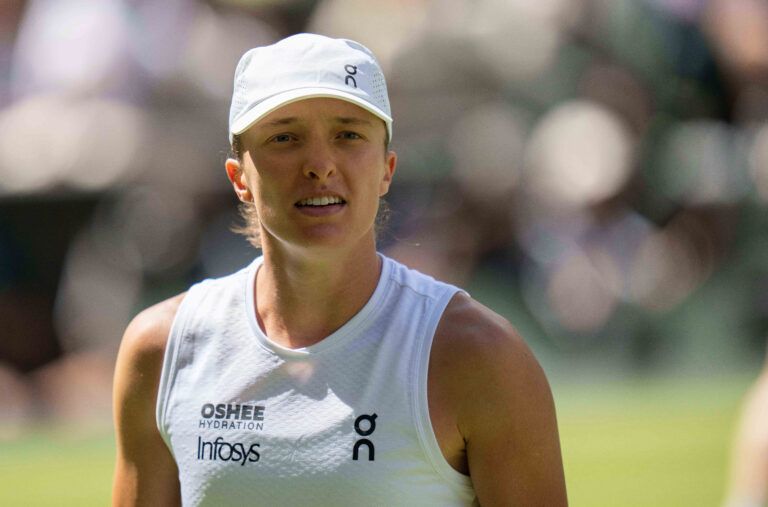 Iga Swiatek of Poland during her match against Taylor Townsend of the United States on day two at All England Lawn Tennis and Croquet Club.