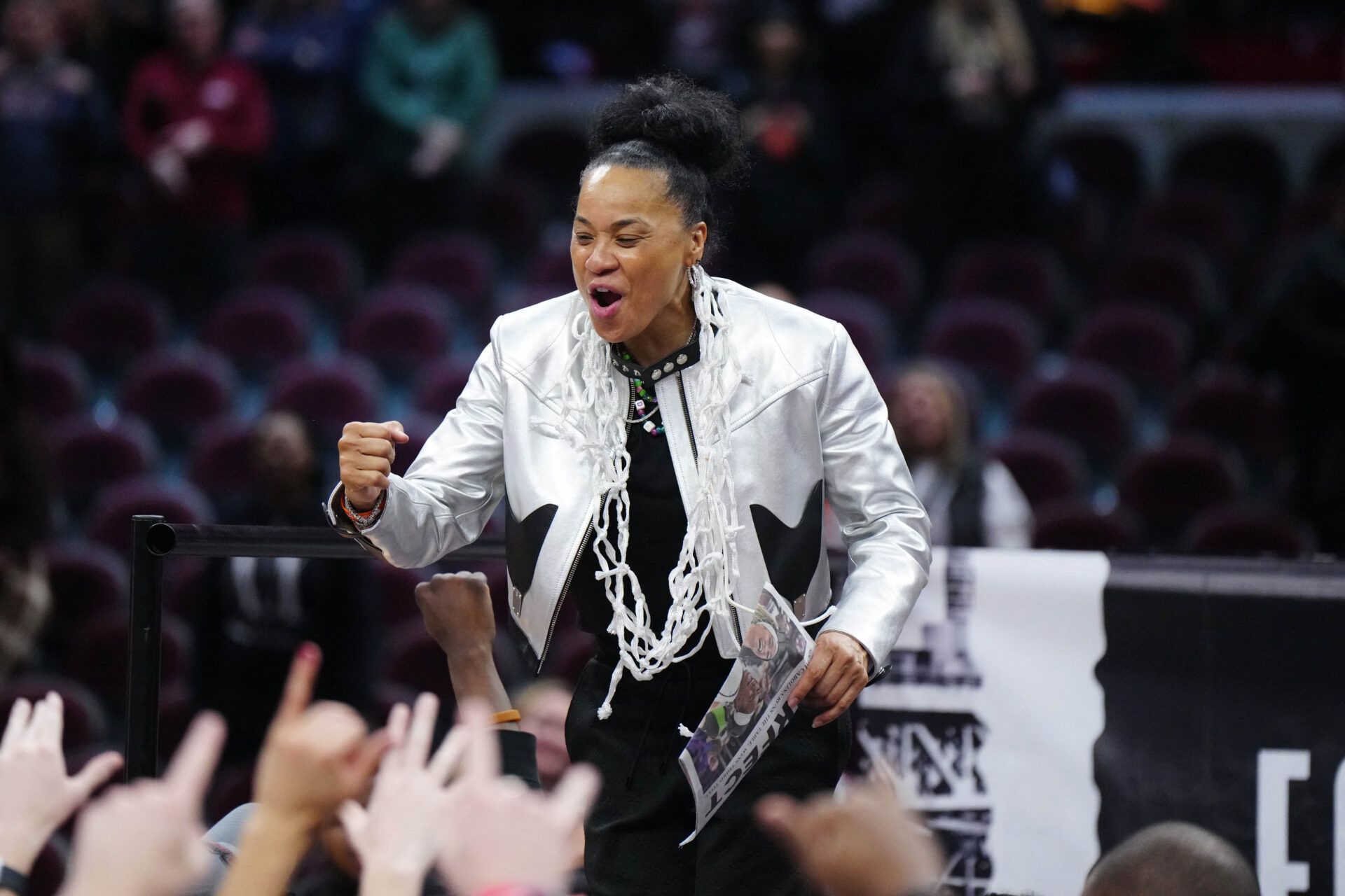 South Carolina Gamecocks head coach Dawn Staley celebrates after defeating the Iowa Hawkeyes in the finals of the Final Four of the womens 2024 NCAA Tournament at Rocket Mortgage FieldHouse.