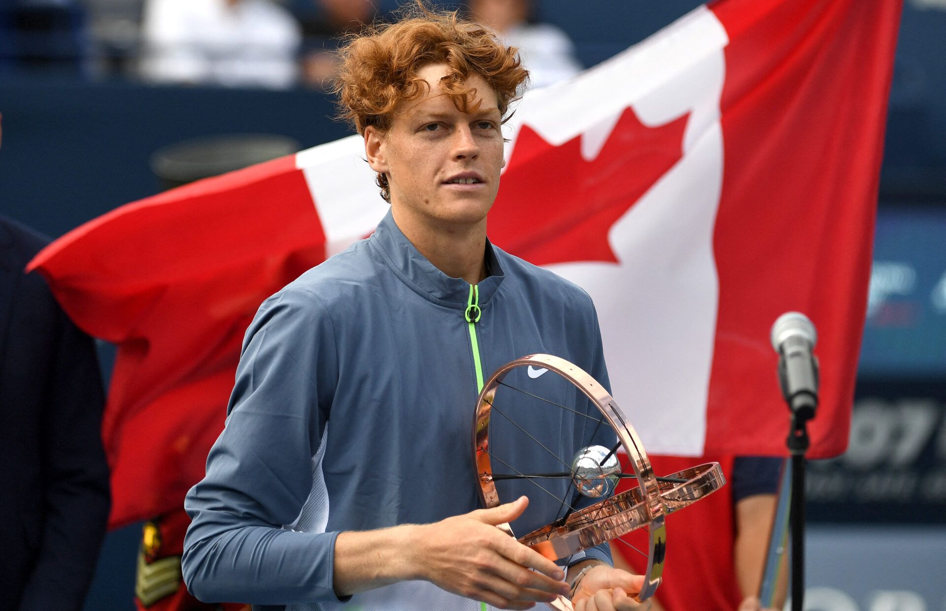 Jannik Sinner (ITA) holds the winner's trophy after defeating Alex De Minaur (AUS) (not pictured) in final round play at Sobeys Stadium.