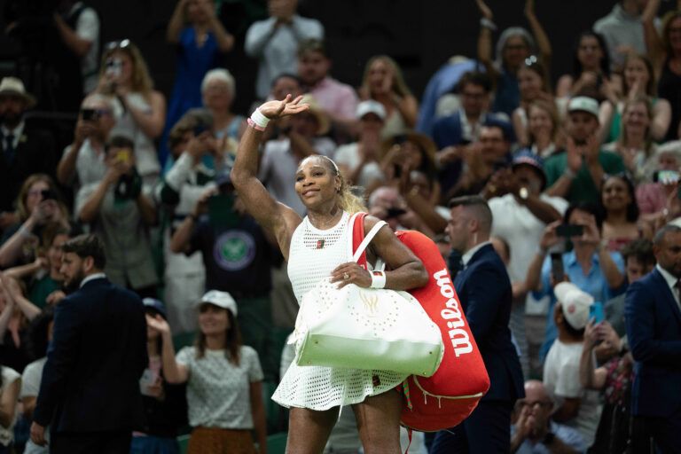 Serena Williams of the United States leaves the court after losing her match against Maya Joint of Australia on day two at All England Lawn Tennis and Croquet Club.