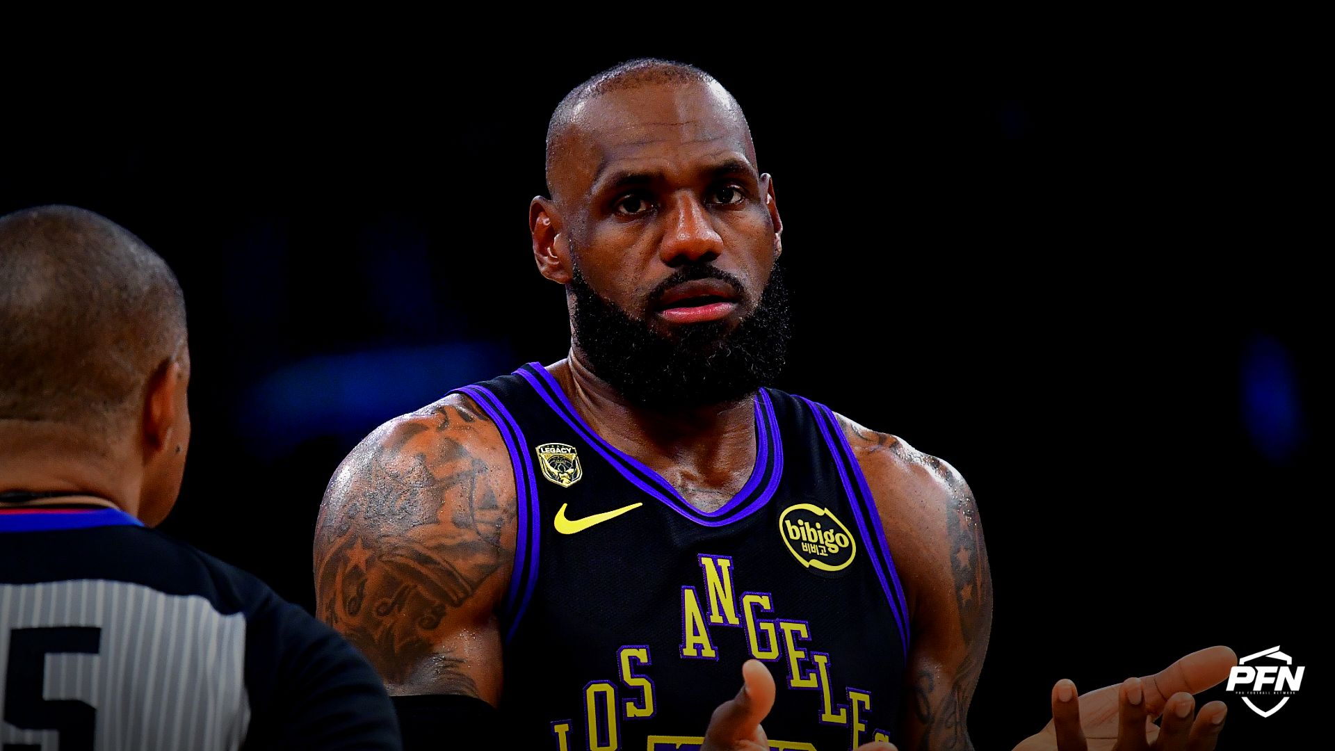 Los Angeles Lakers forward LeBron James (23) speaks with official Tony Brothers during the first half in game four of the second round of the 2026 NBA Playoffs at Crypto.com Arena.