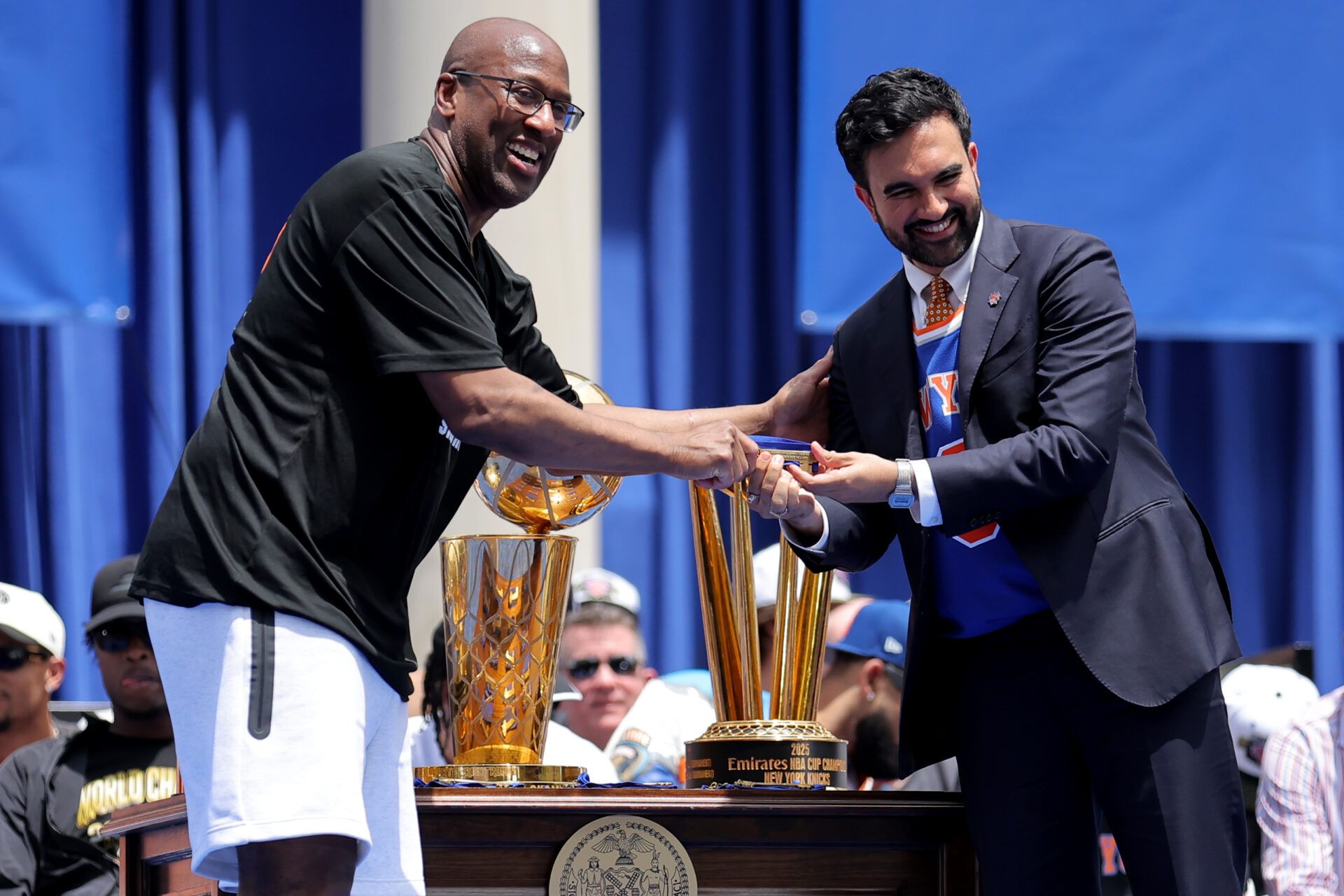New York Knicks head coach Mike Brown poses for a photo with mayor Zohran Mamdani after receiving a key to the city during a ceremony at New York City Hall after the championship parade.
