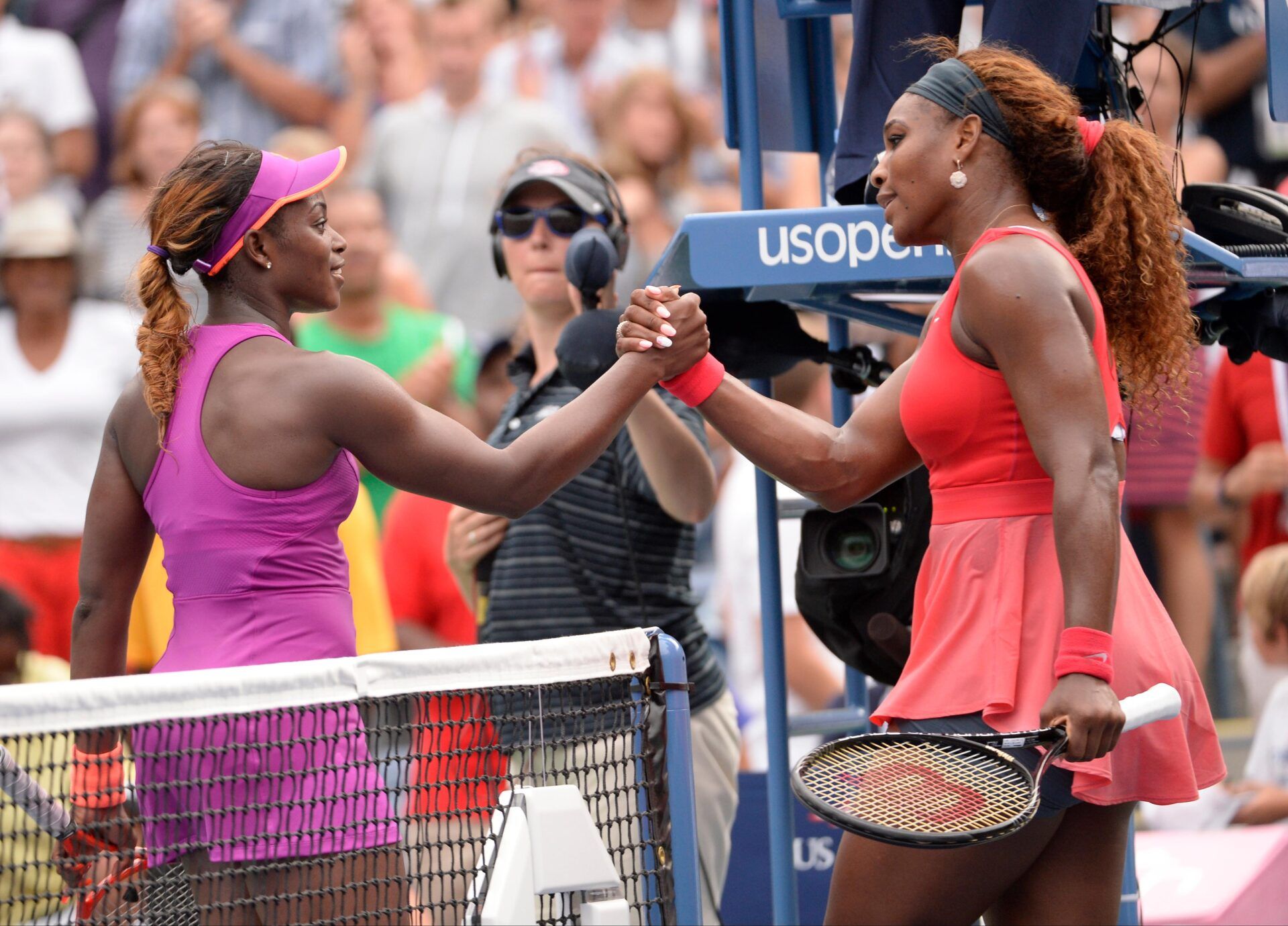 Serena Williams (USA), right, shakes hands with Sloane Stephens (USA) after their match on day seven of the 2013 US Open at the Billie Jean King National Tennis Center.