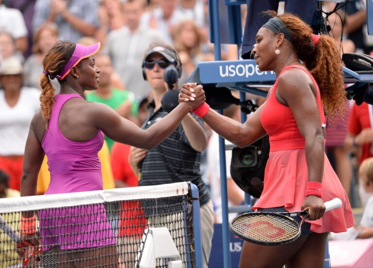 Serena Williams (USA), right, shakes hands with Sloane Stephens (USA) after their match on day seven of the 2013 US Open at the Billie Jean King National Tennis Center.