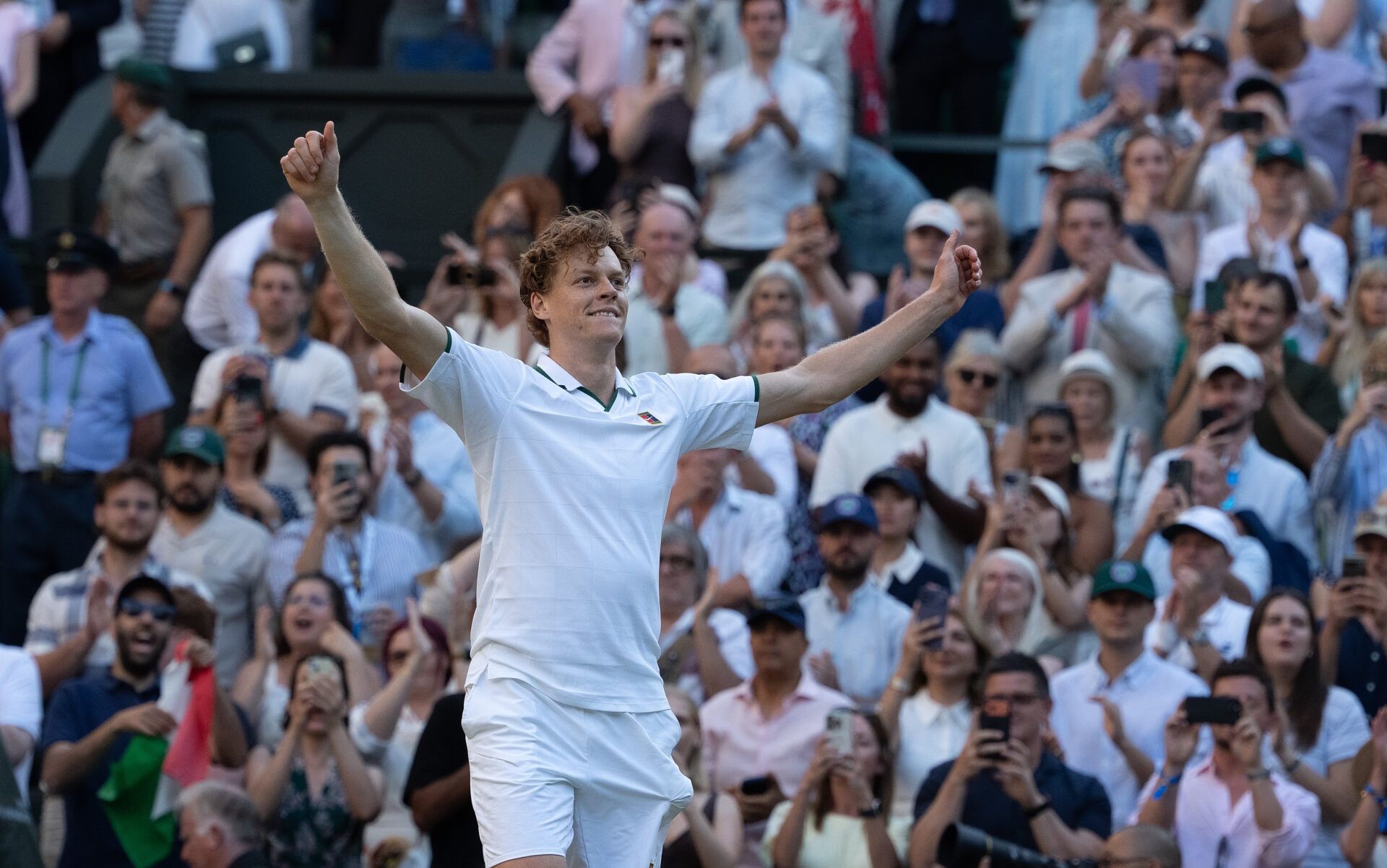 Jannik Sinner of Italy celebrates winning the mens singles final against Alexander Zverev of Germany on day 14 at All England Lawn Tennis and Croquet Club.