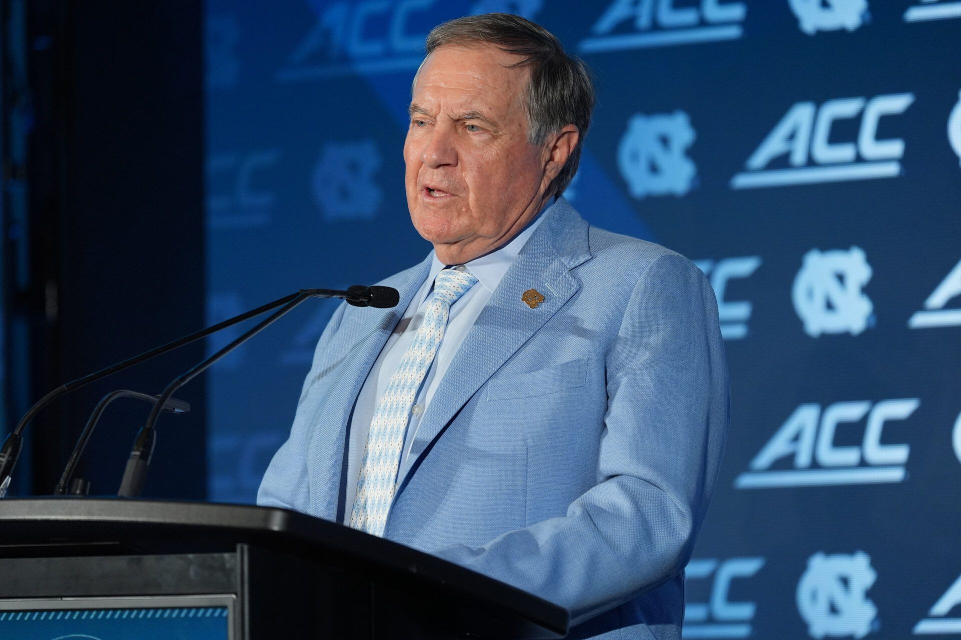 North Carolina head coach Bill Belichick talks with the media during interviews at Hilton Charlotte Uptown.
