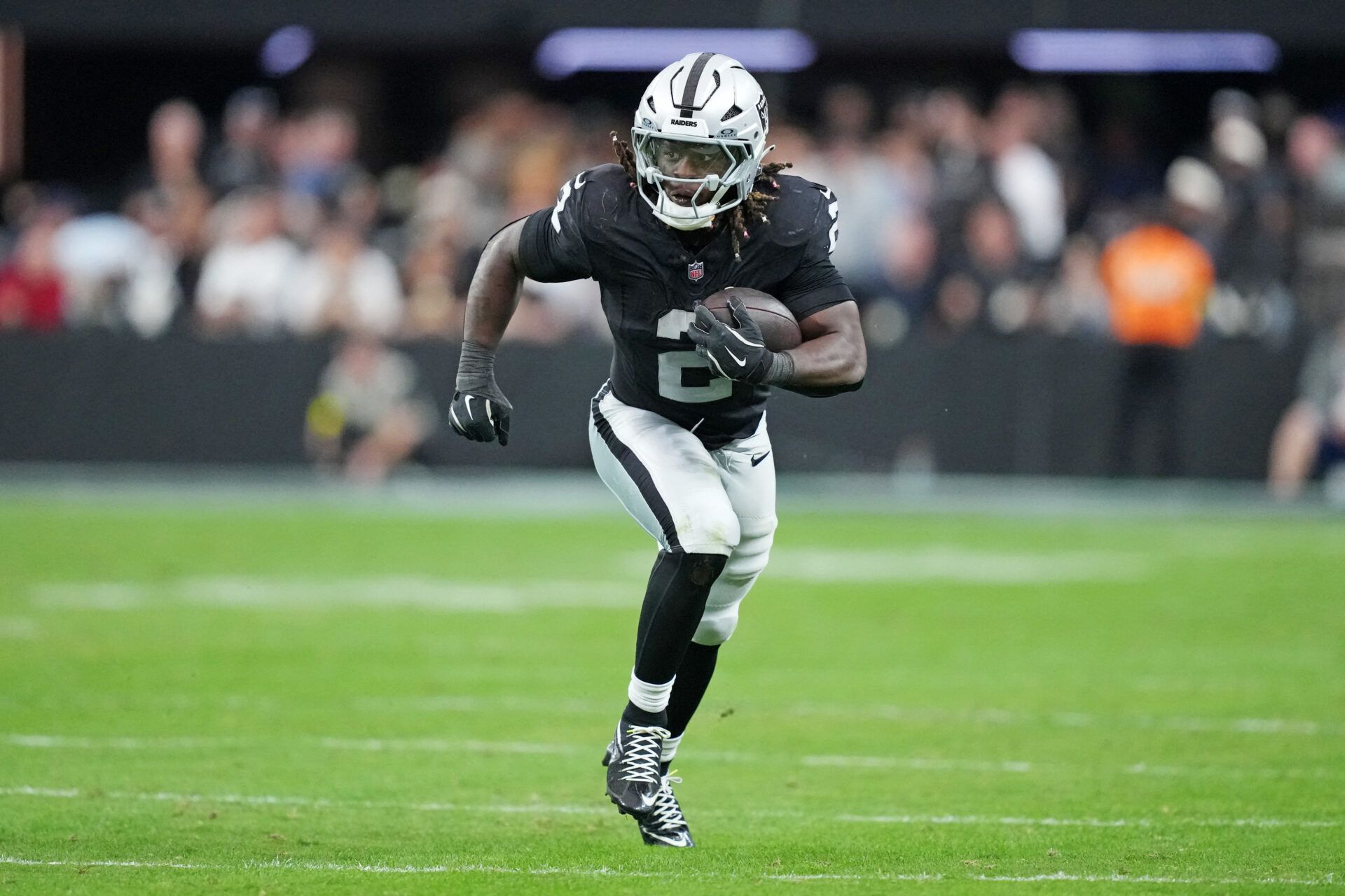 Las Vegas Raiders running back Ashton Jeanty (2) runs the ball during the second half against the Jacksonville Jaguars at Allegiant Stadium.