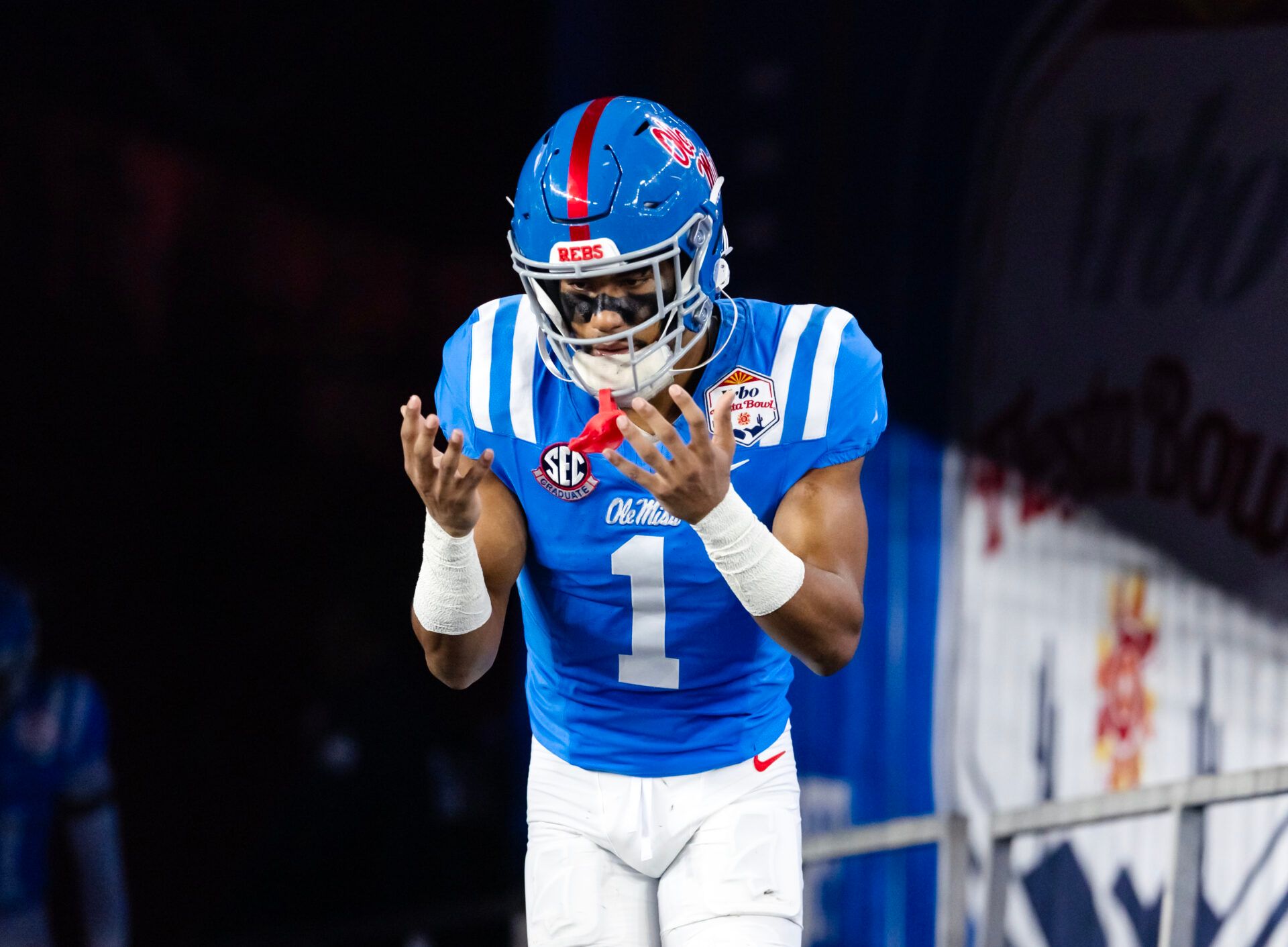 Mississippi Rebels wide receiver De'Zhaun Stribling (1) against the Miami Hurricanes during the 2026 Fiesta Bowl and semifinal game of the College Football Playoff at State Farm Stadium.