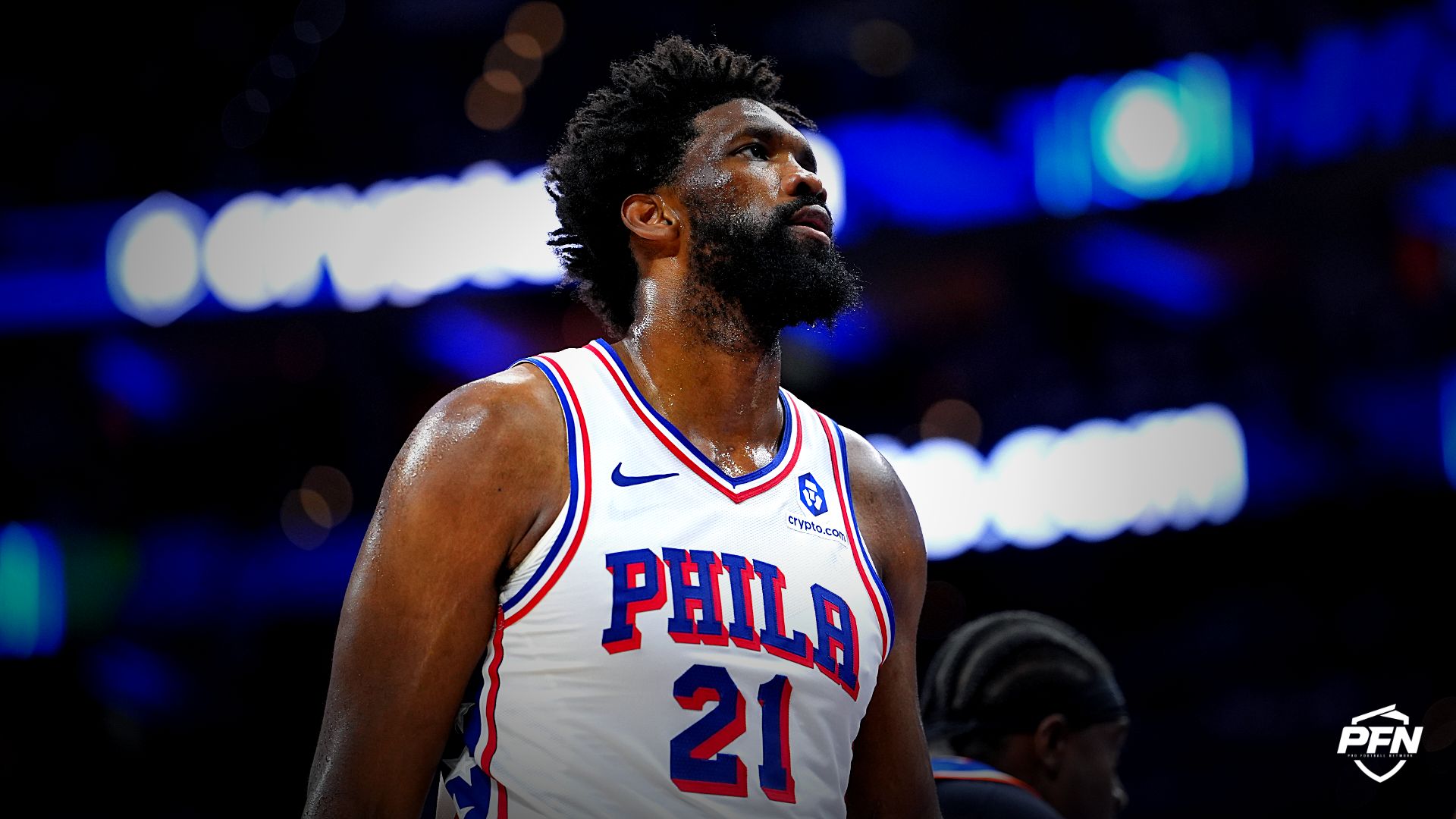 Philadelphia 76ers center Joel Embiid (21) looks on against the New York Knicks in the second quarter during game four of the second round of the 2026 NBA Playoffs at Xfinity Mobile Arena.