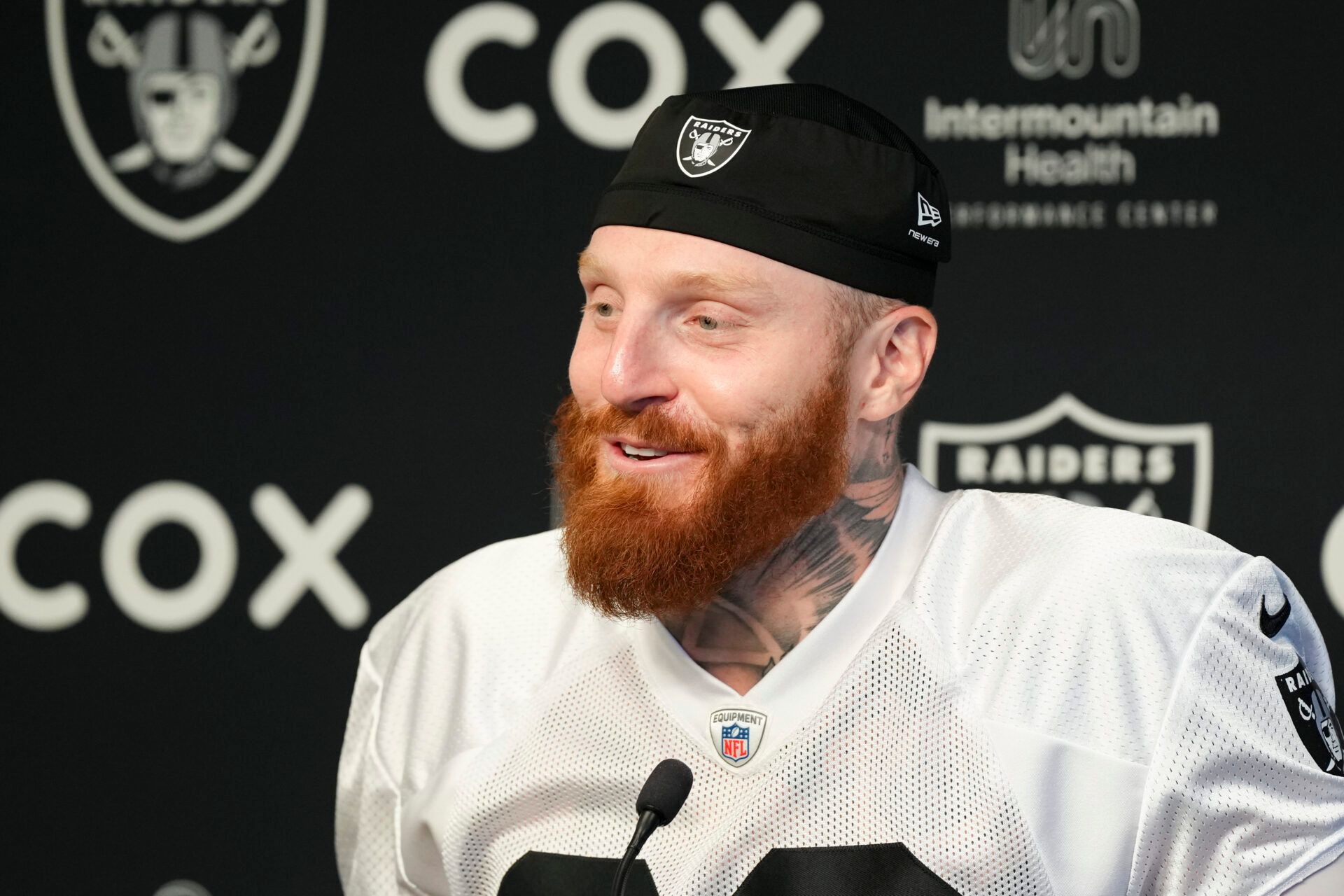 Las Vegas Raiders defensive end Maxx Crosby (98) speaks during a news conference during organized team activities at Intermountain Health Performance Center.