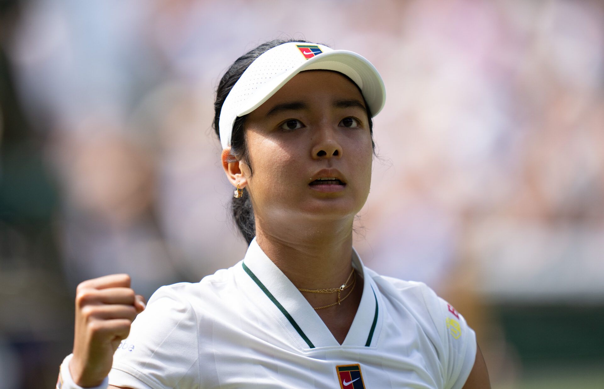 Alexandra Eala of the Philippines reacts during her match against Iga Swiatek of Poland on day six at All England Lawn Tennis and Croquet Club.