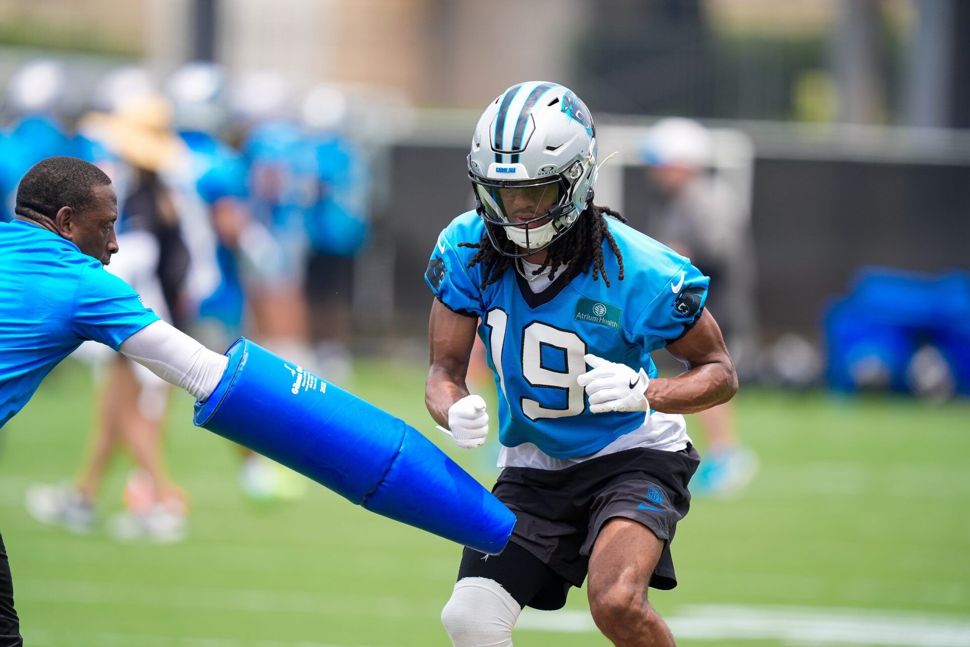 Carolina Panthers wide receiver Chris Brazzell III (19) practices and avoidance drill during the first day of mini camp at Bank of America Stadium practice facility.