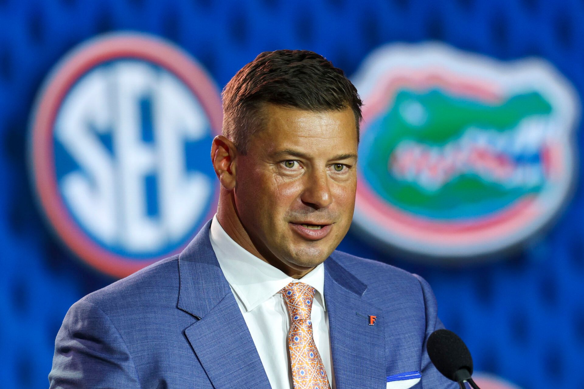 Florida Gators head coach Jon Sumrall speaks to the press during SEC Football Kickoff Media Day at the Tampa Marriott.
