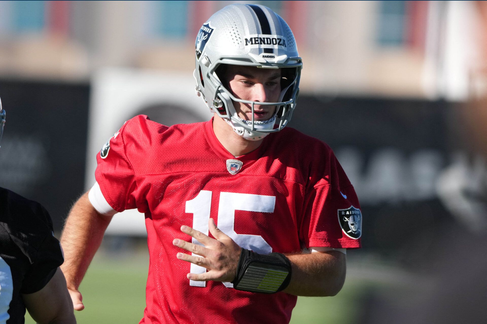 Las Vegas Raiders quarterback Fernando Mendoza (15) runs during minicamp at Intermountain Health Performance Center.