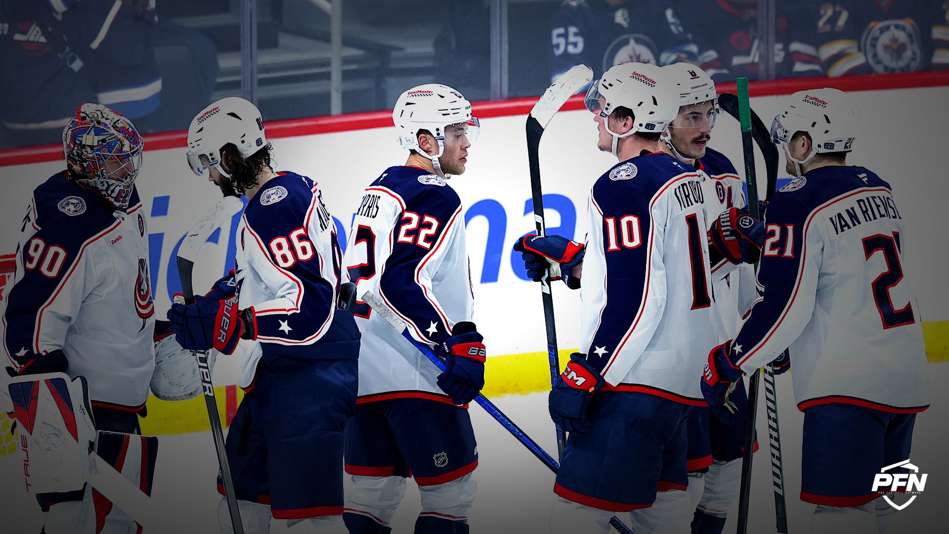 Columbus Blue Jackets players celebrate their victory at Canada Life Centre.