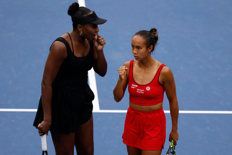 Venus Williams (USA) (L) talks with partner Leylah Fernandez (CAN) (R) between points against Katerina Siniakova (CZE) and Taylor Townsend (USA) (both not pictured) on day ten of the 2025 US Open tennis championships at Billie Jean King National Tennis Center.