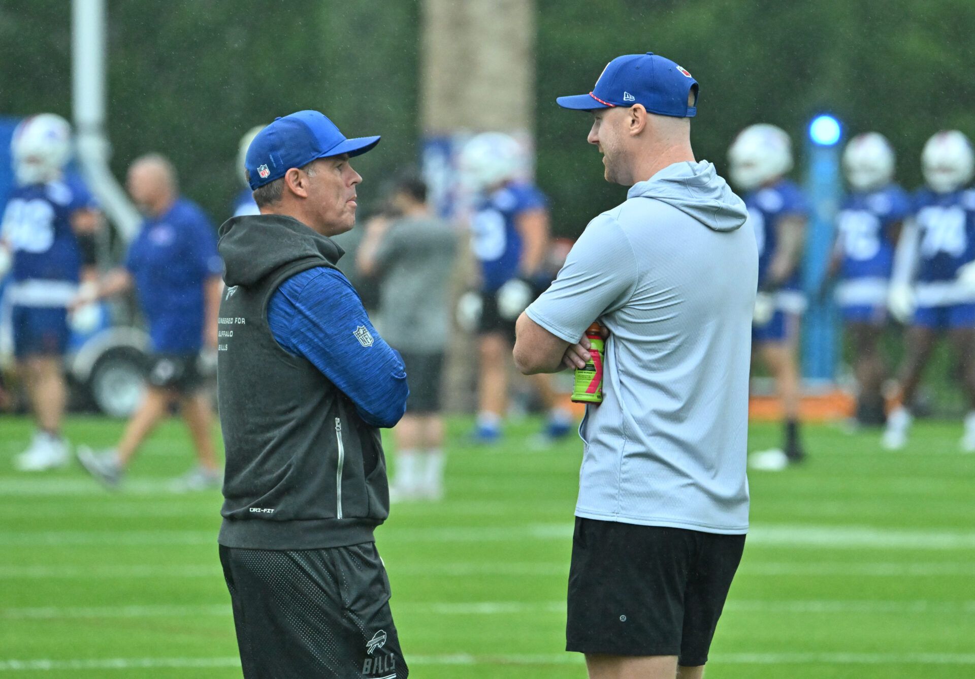 Buffalo Bills head coach Joe Brady (right) speaks with general manager Brandon Beane during training camp at St. John Fisher University.
