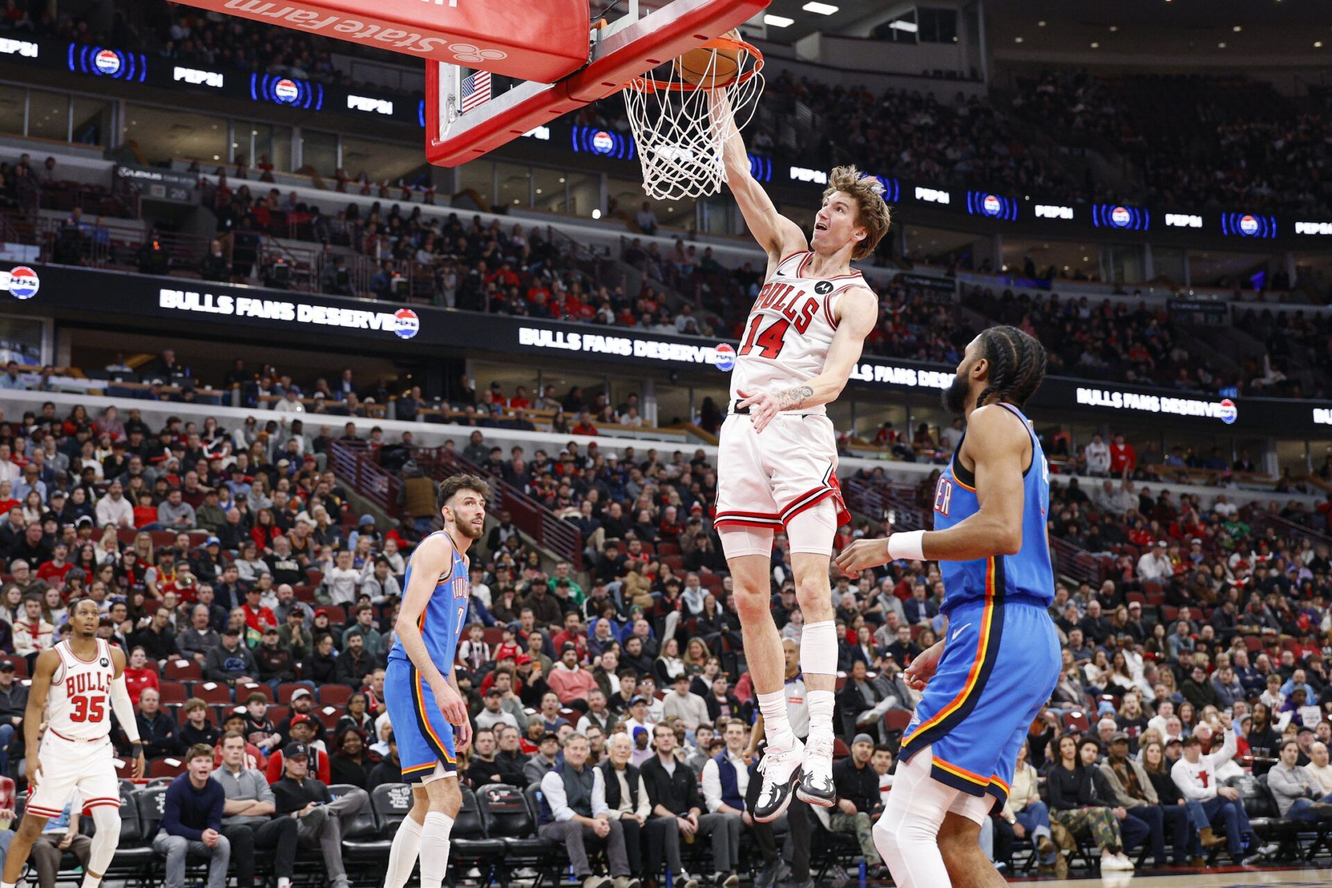 Chicago Bulls forward Matas Buzelis (14) goes to the basket against the Oklahoma City Thunder during the first half at United Center.