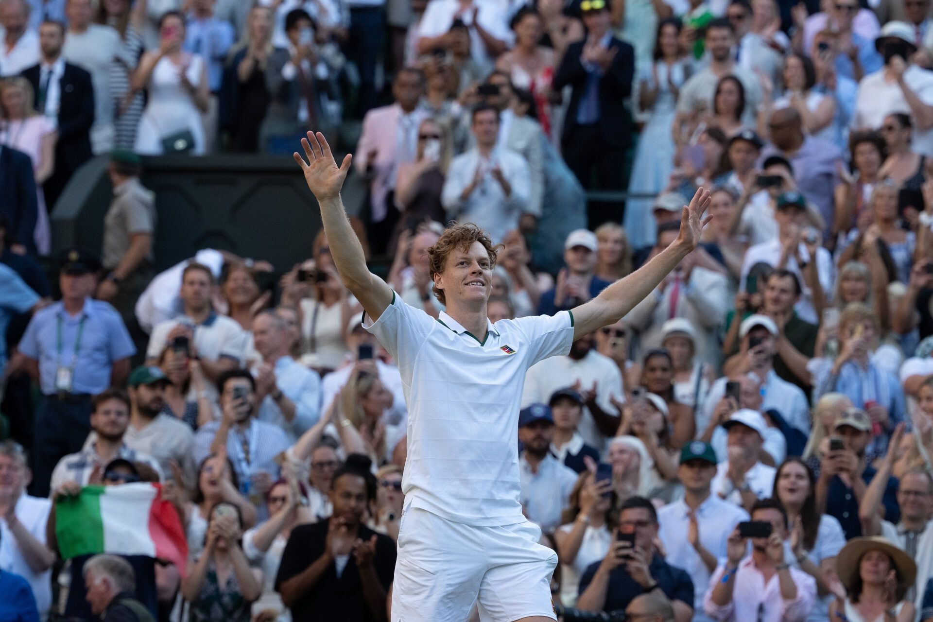 Jannik Sinner of Italy celebrates winning the mens singles final against Alexander Zverev of Germany on day 14 at All England Lawn Tennis and Croquet Club.