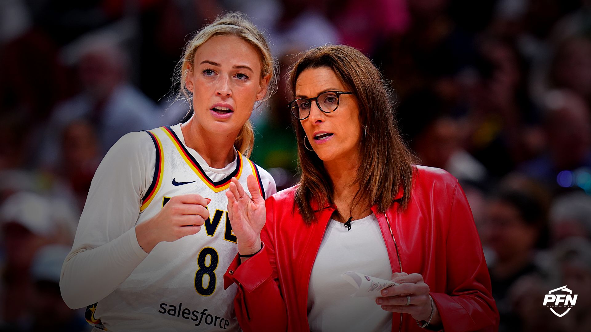 Indiana Fever head coach Stephanie White talks with guard Sophie Cunningham (8) from the sideline as they take on the Connecticut Sun at TD Garden.