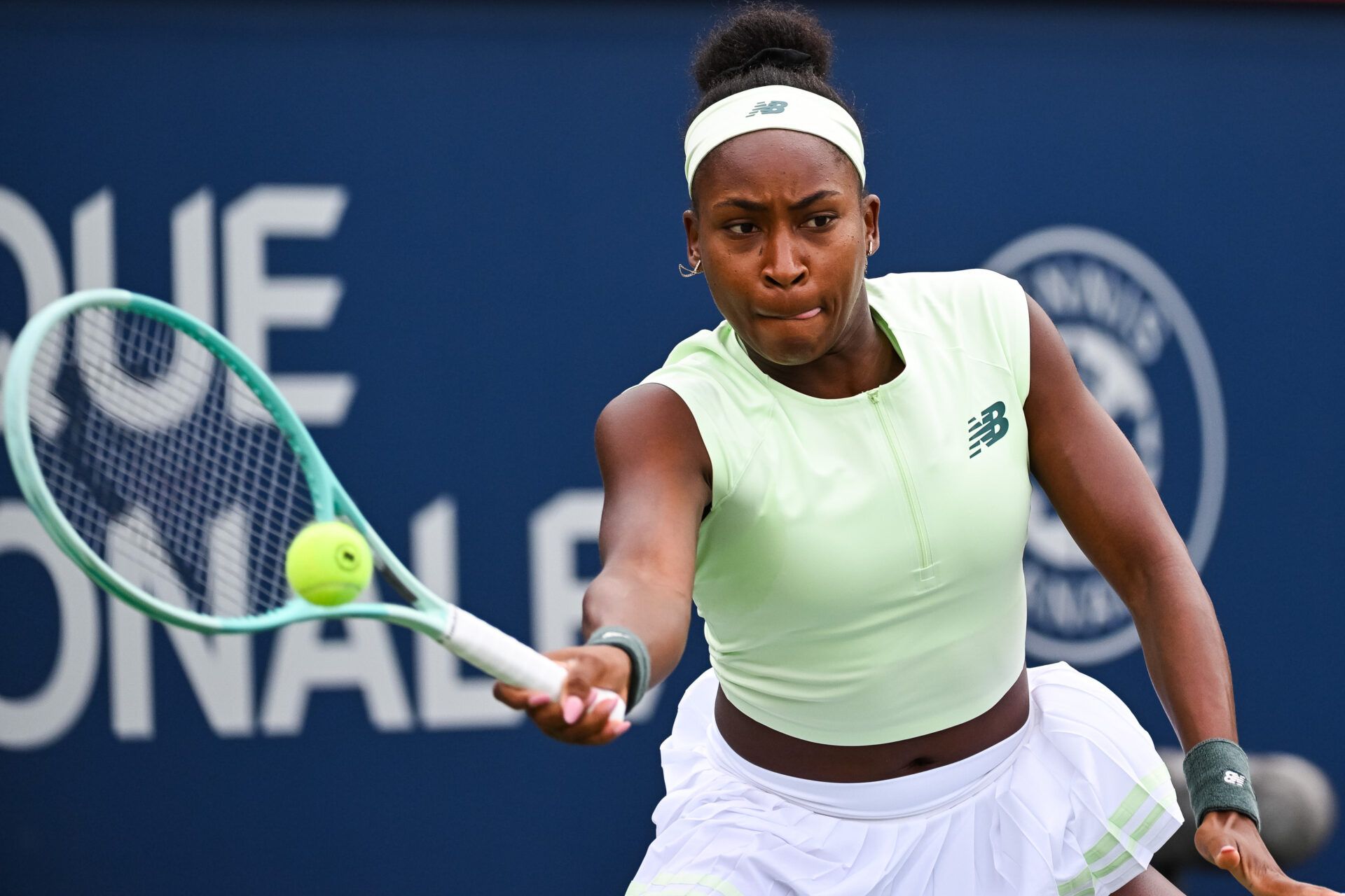 Coco Gauff (USA) returns the ball to Veronika Kudermetova in third round play at IGA Stadium.