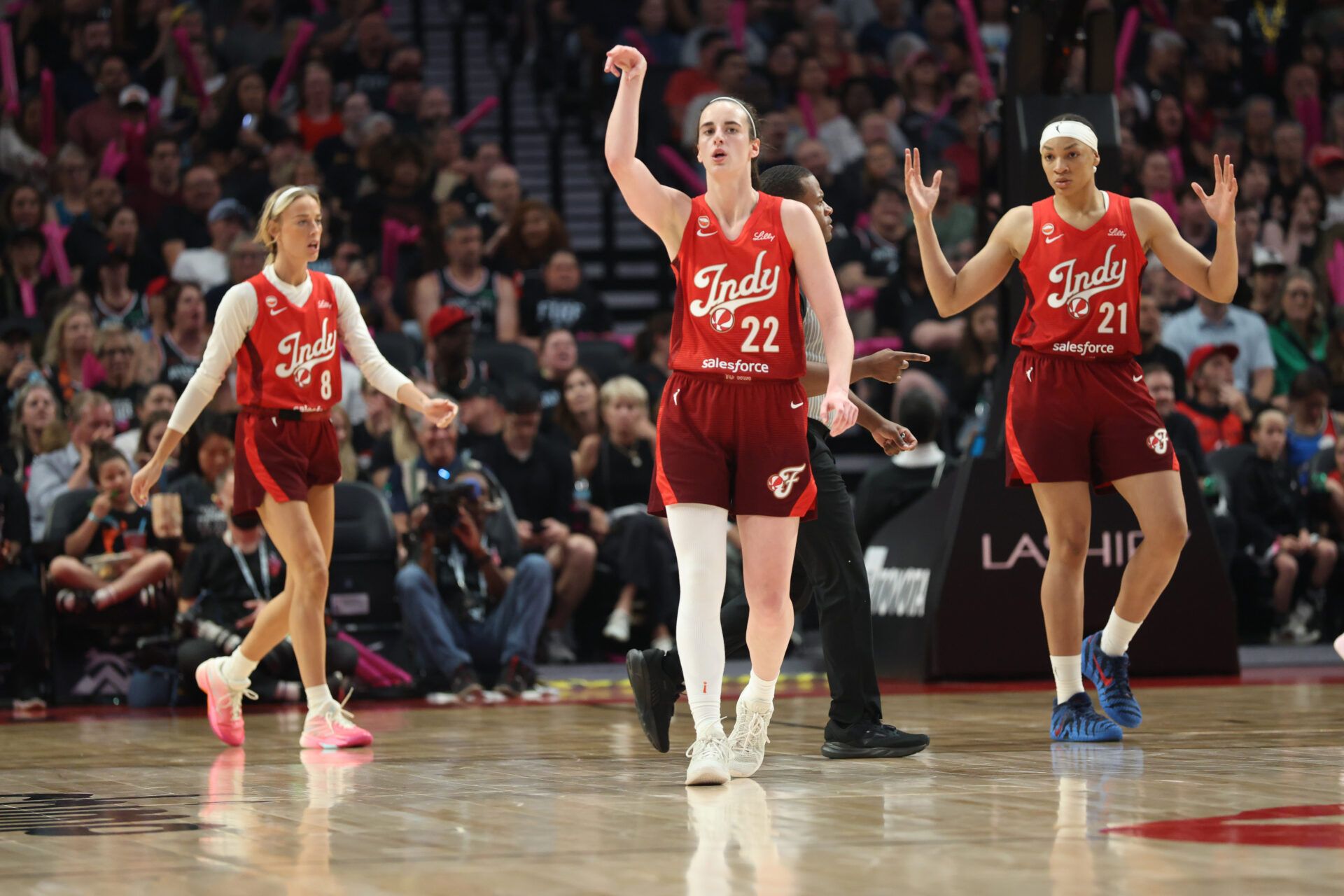 Indiana Fever guard Caitlin Clark (22) reacts after a three-point shot attempt against the Portland Fire during the second half at Moda Center.