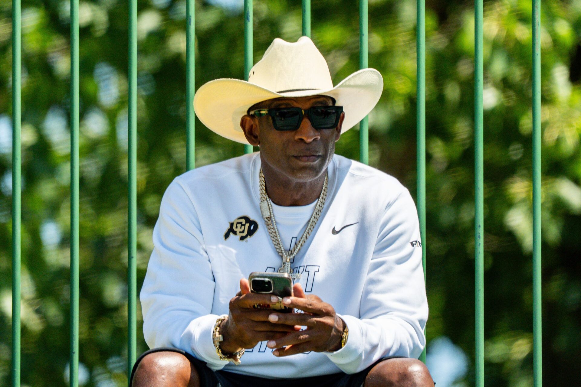 Deion Sanders takes in the second day of Cleveland Browns training camp, July 30, 2026, in Berea, Ohio.