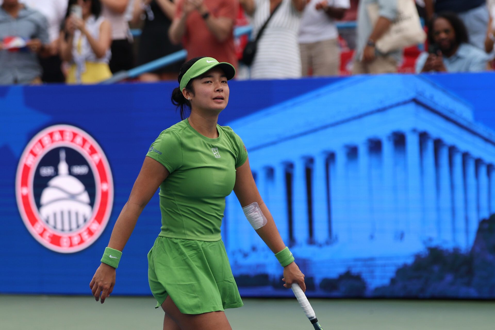 Alexandra Eala (PHI) walks to her player's box after her match against Naomi Osaka (JPN) (not pictured) in a women's singles semifinal on day six of the 2026 Mubadala DC Open at Rock Creek Park Tennis Center.