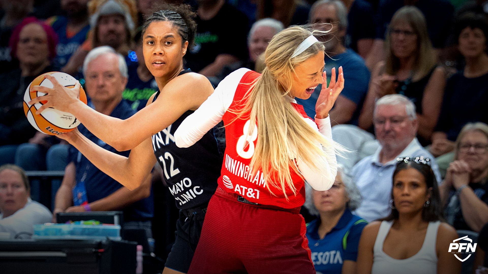 Sophie Cunningham takes a hard elbow to the face as WNBA world questions the officials' controversial defensive foul call on Fever guard.
