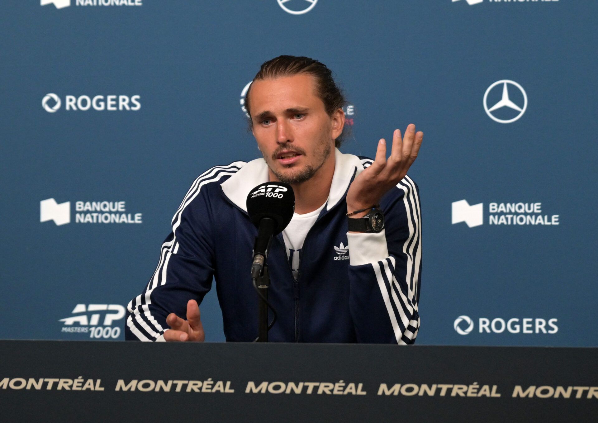 Alexander Zverev (GER) gives a presser during first round play at IGA Stadium.