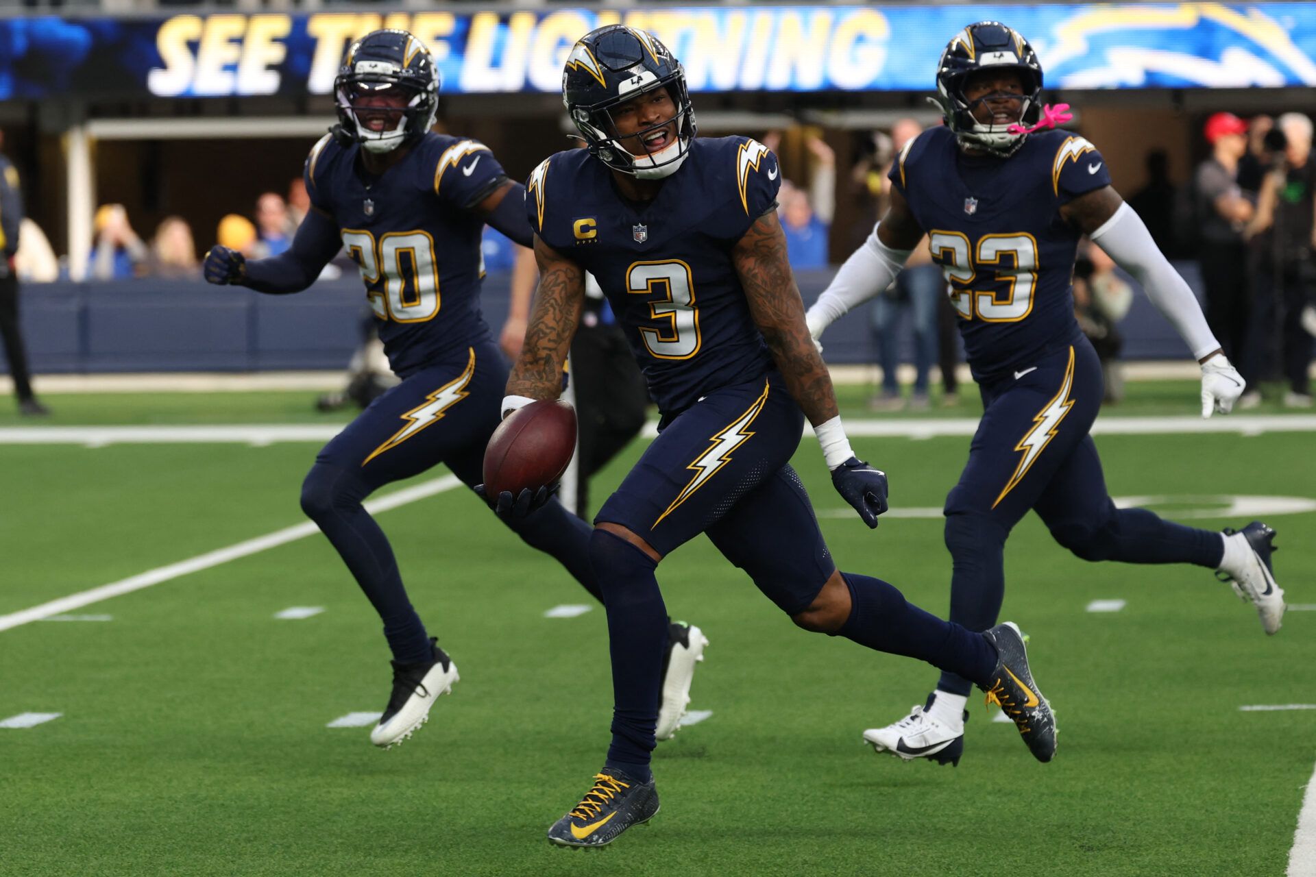 Los Angeles Chargers safety Derwin James Jr. (3) reacts after making an interception against the Houston Texans during the first half at SoFi Stadium.