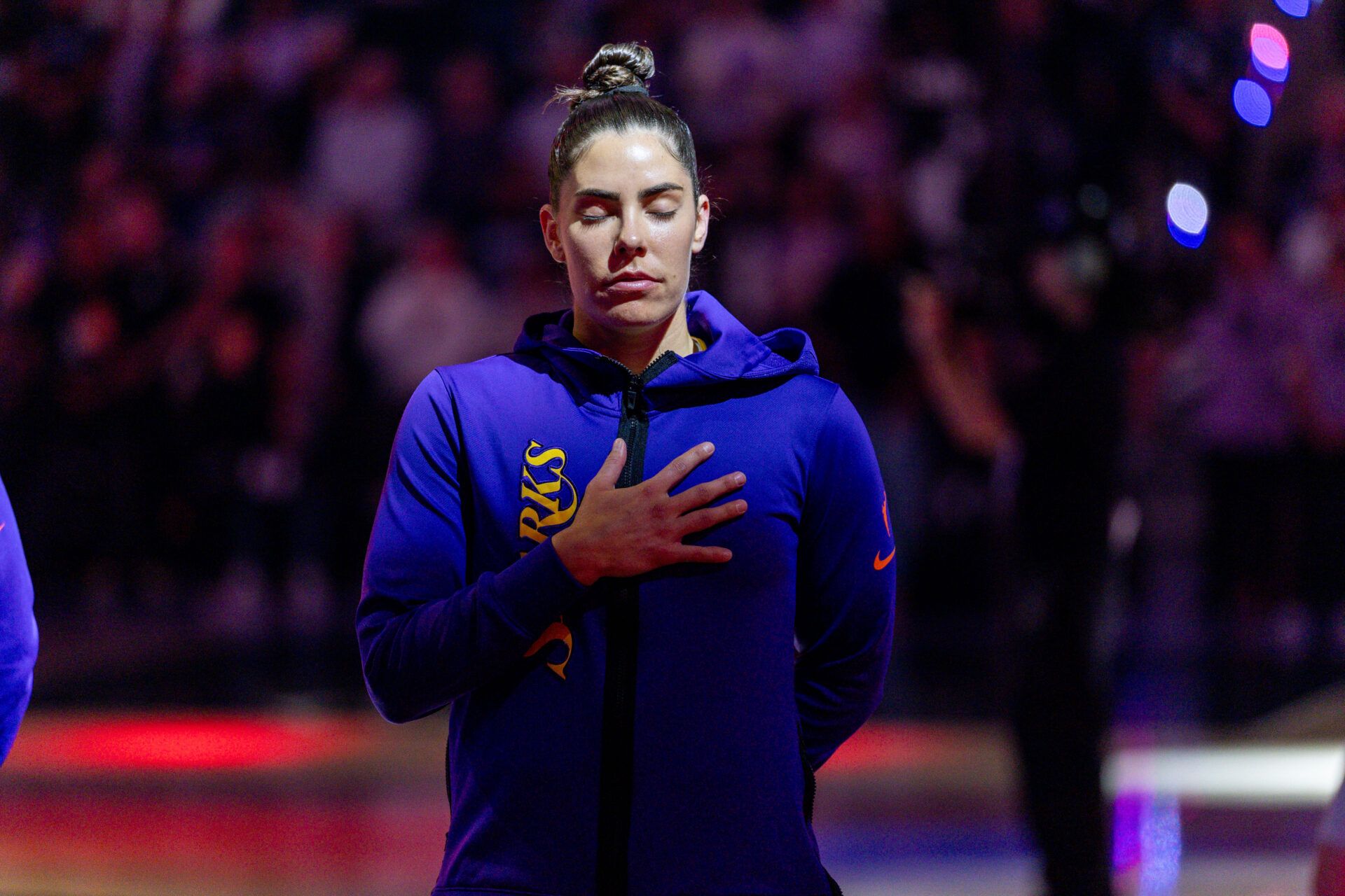 Angeles Sparks guard Kelsey Plum (10) listens to the National Anthem before the game against the Golden State Valkyries in a Commissioner’s Cup game at Chase Center.