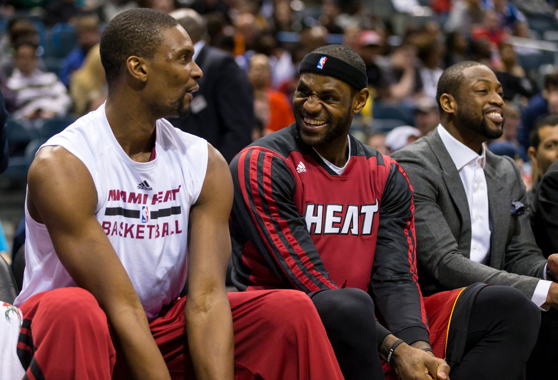 Miami Heat forward LeBron James (6) and center Chris Bosh (1) enjoy a moment on the bench during the fourth quarter against the Milwaukee Bucks at BMO Harris Bradley Center.  Miami won 88-67.